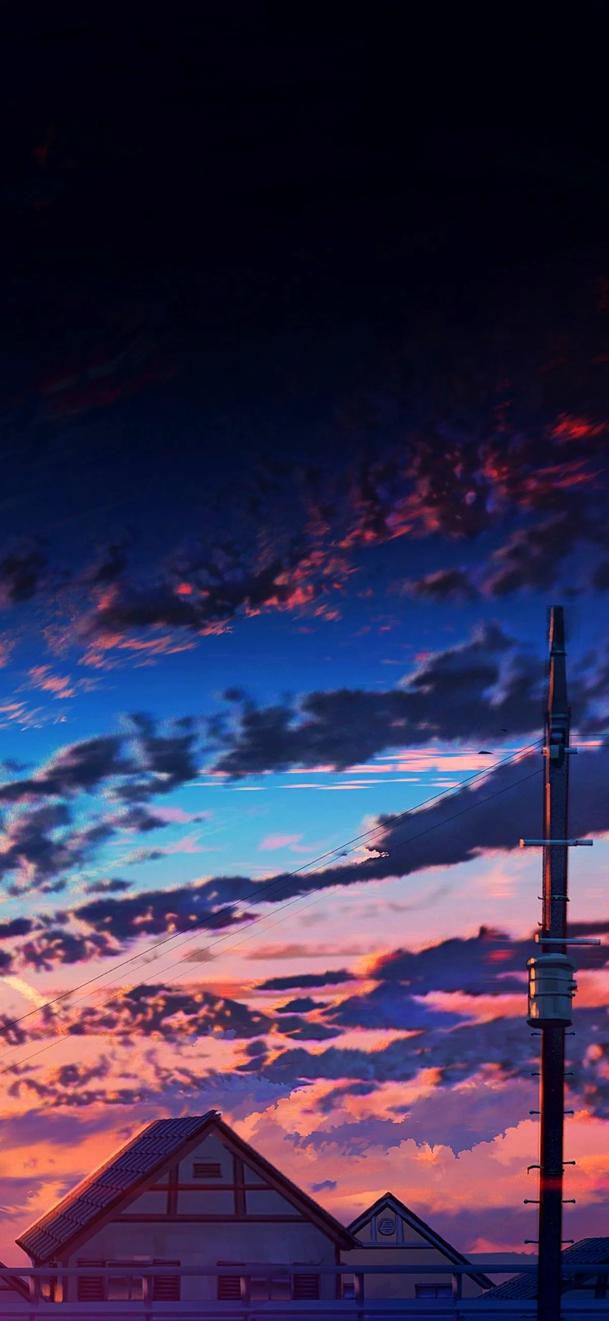 Vibrant Sunset Sky Over Calm Water with Silhouetted Trees