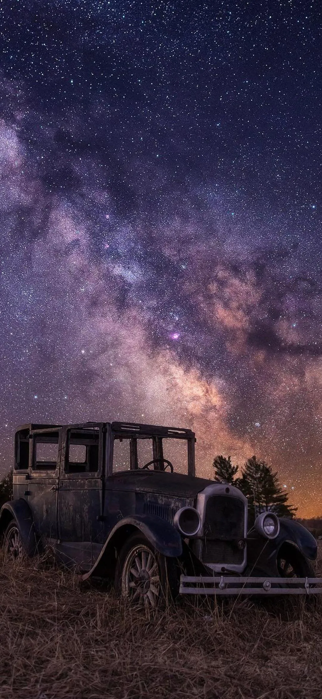 Vintage Jeep Parked in Desert Under Star Filled Sky