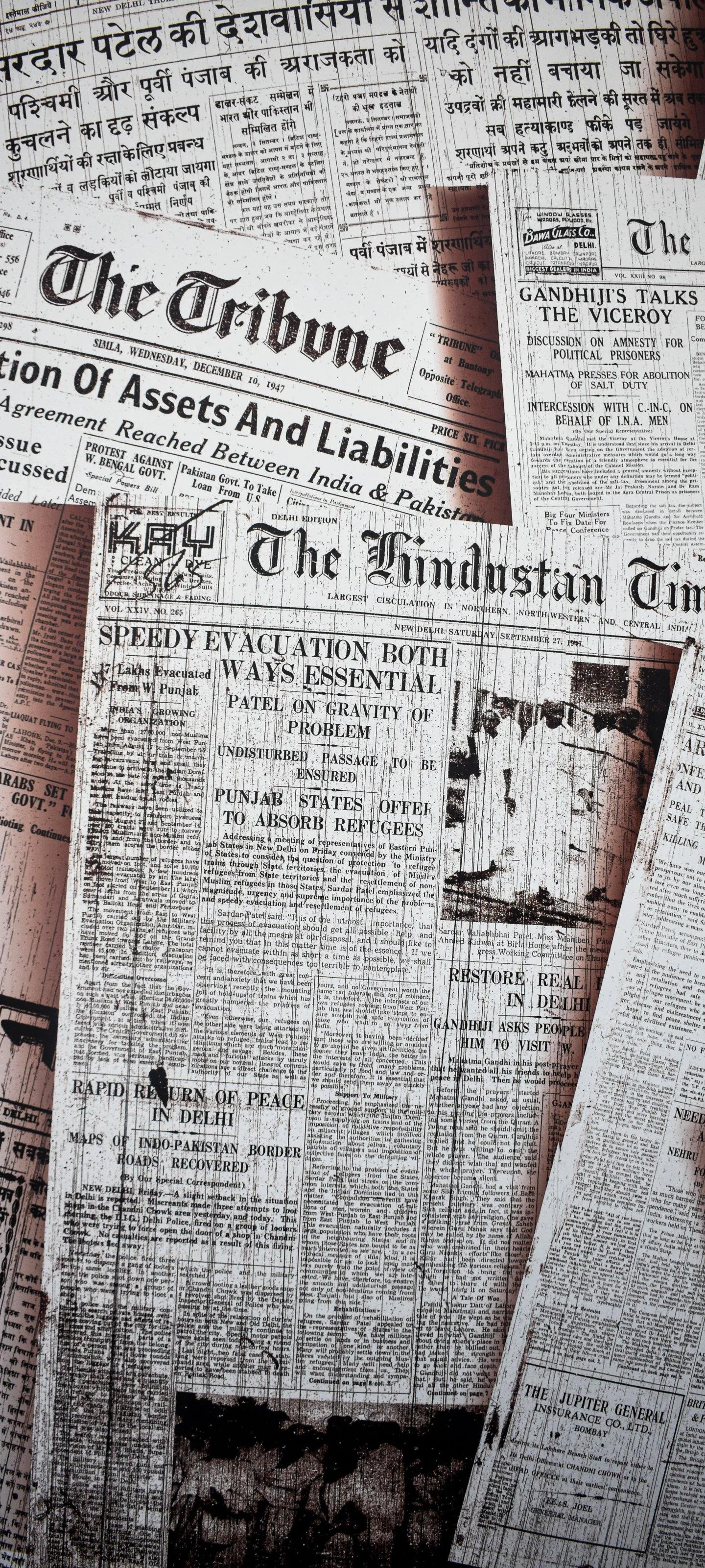 Vintage Newspapers with Headlines and Old Fonts Image