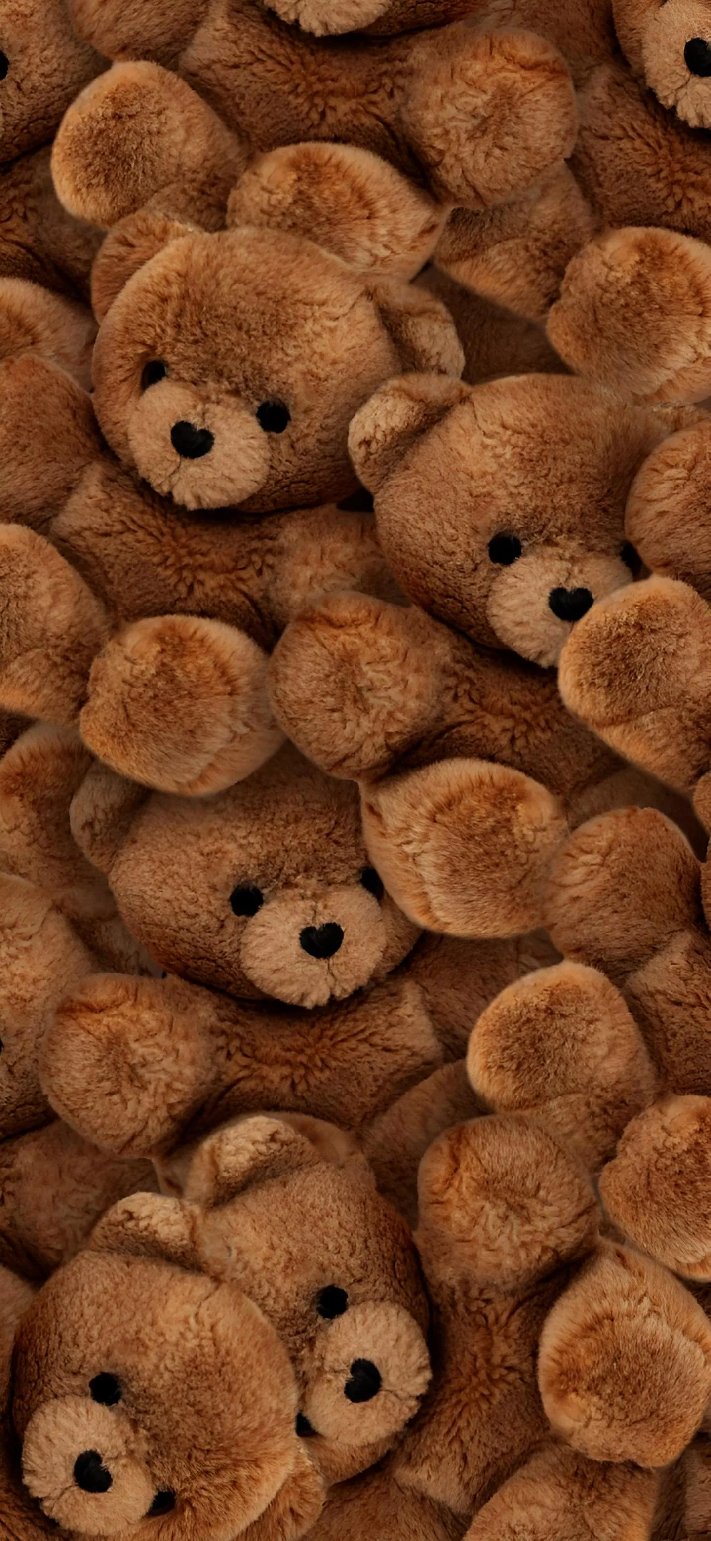 Wallpaper of Soft and Cuddly Teddy Bears Piled Together