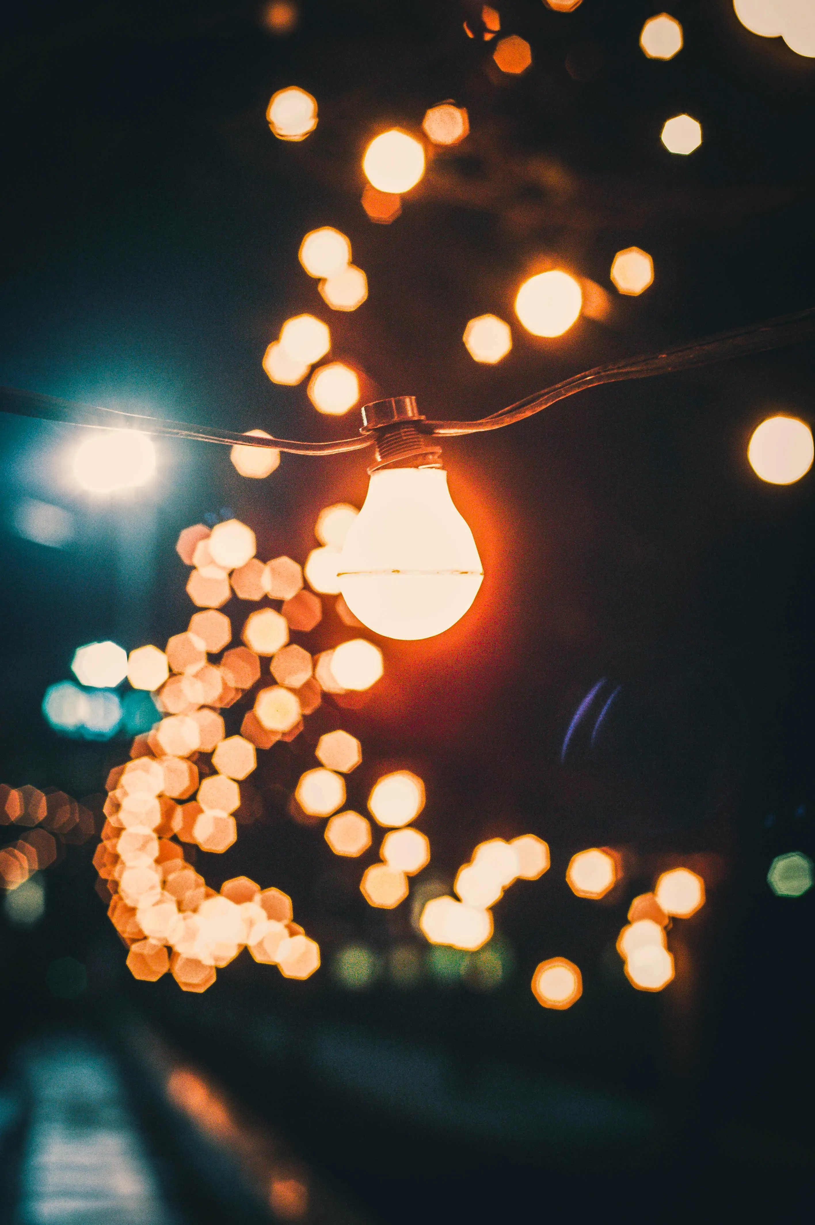 Warm Bokeh Lights Creating Cozy Night Ambience Wallpaper