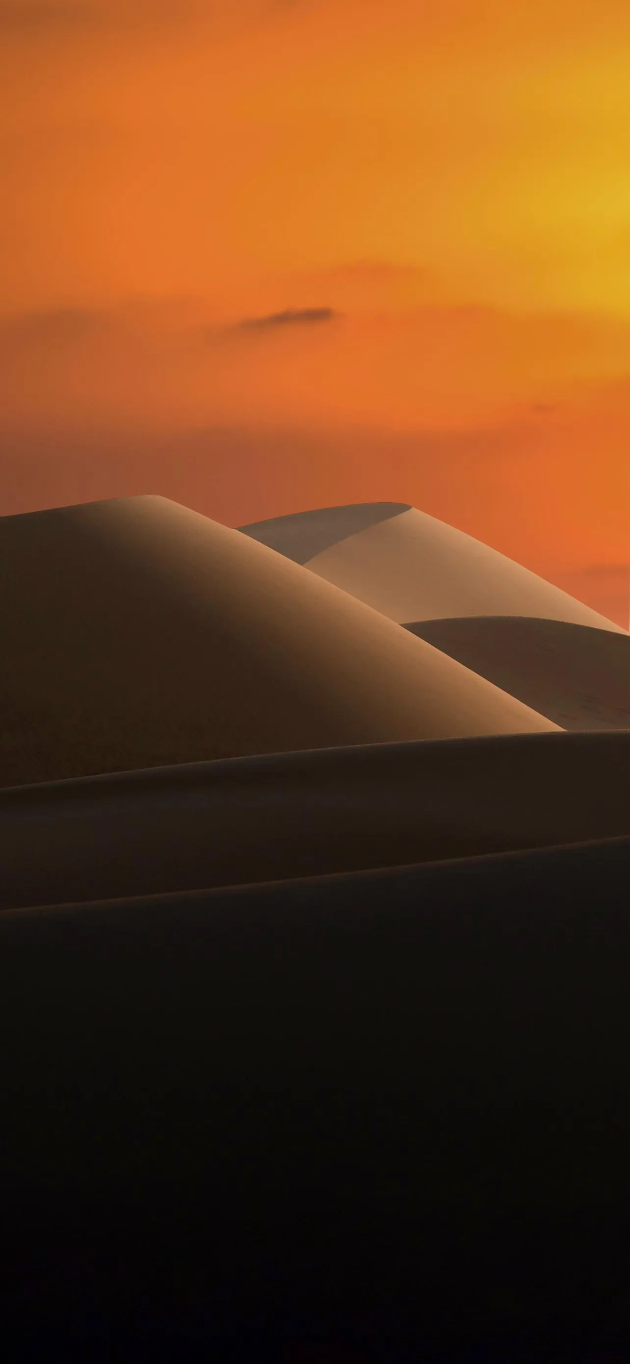 Warm Desert Landscape with Soft Orange Sky Wallpaper