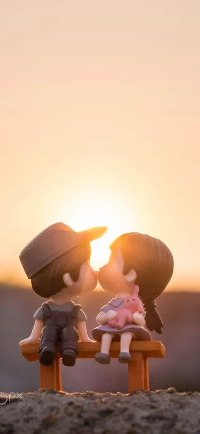 Warm Sunset Scene With Couple Holding Hands Together