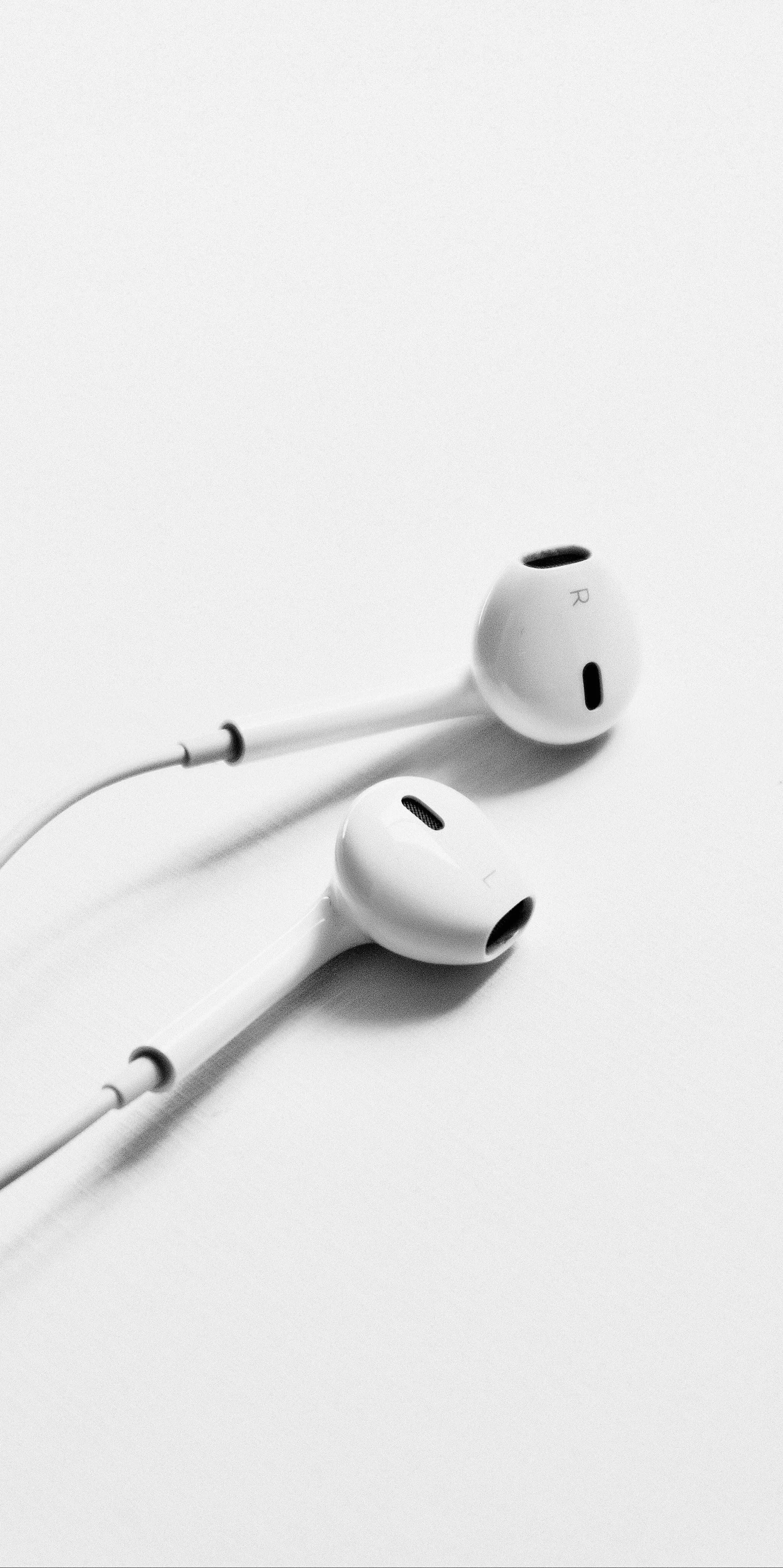 White Earphones on Minimal Clean White Background HD