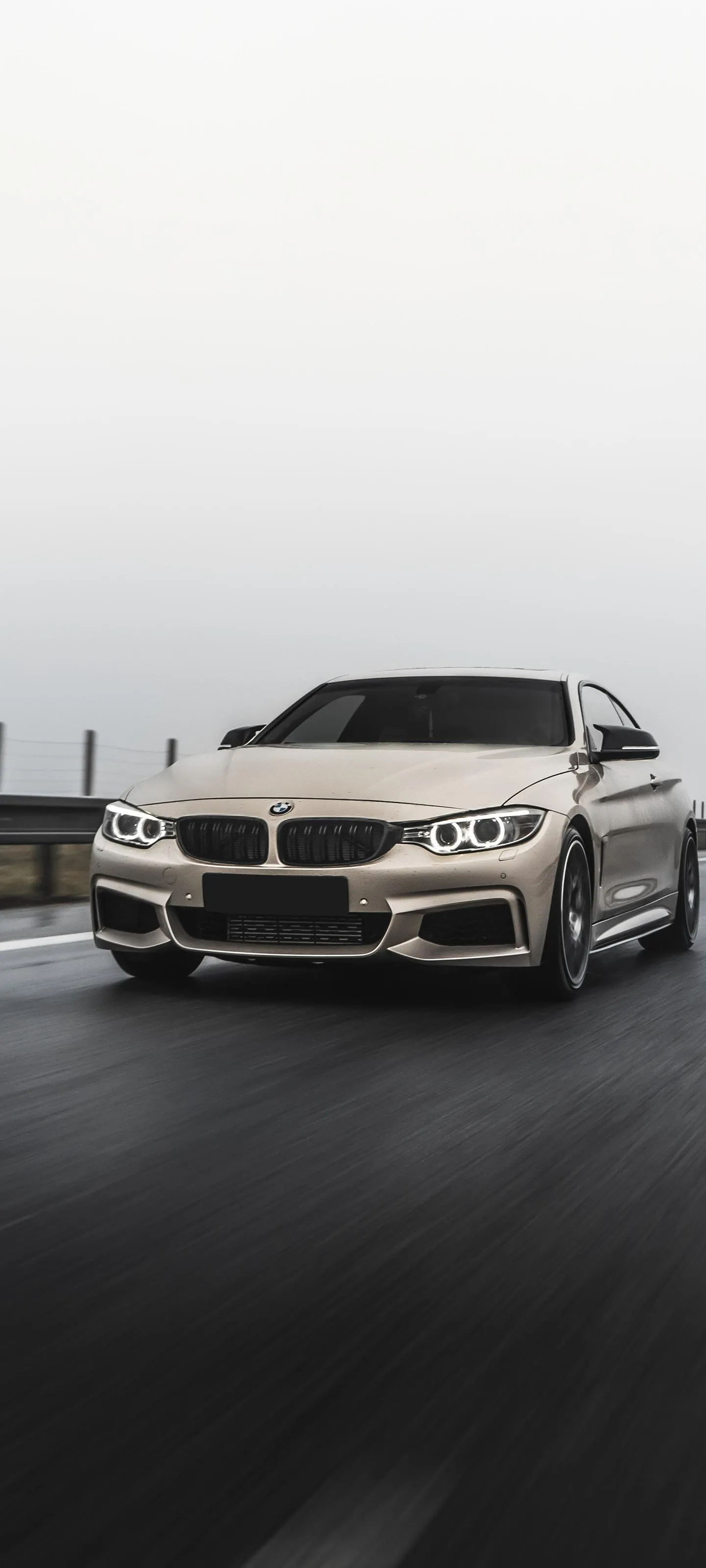 White Luxury Car Driving through Morning Fog Art Wallpaper