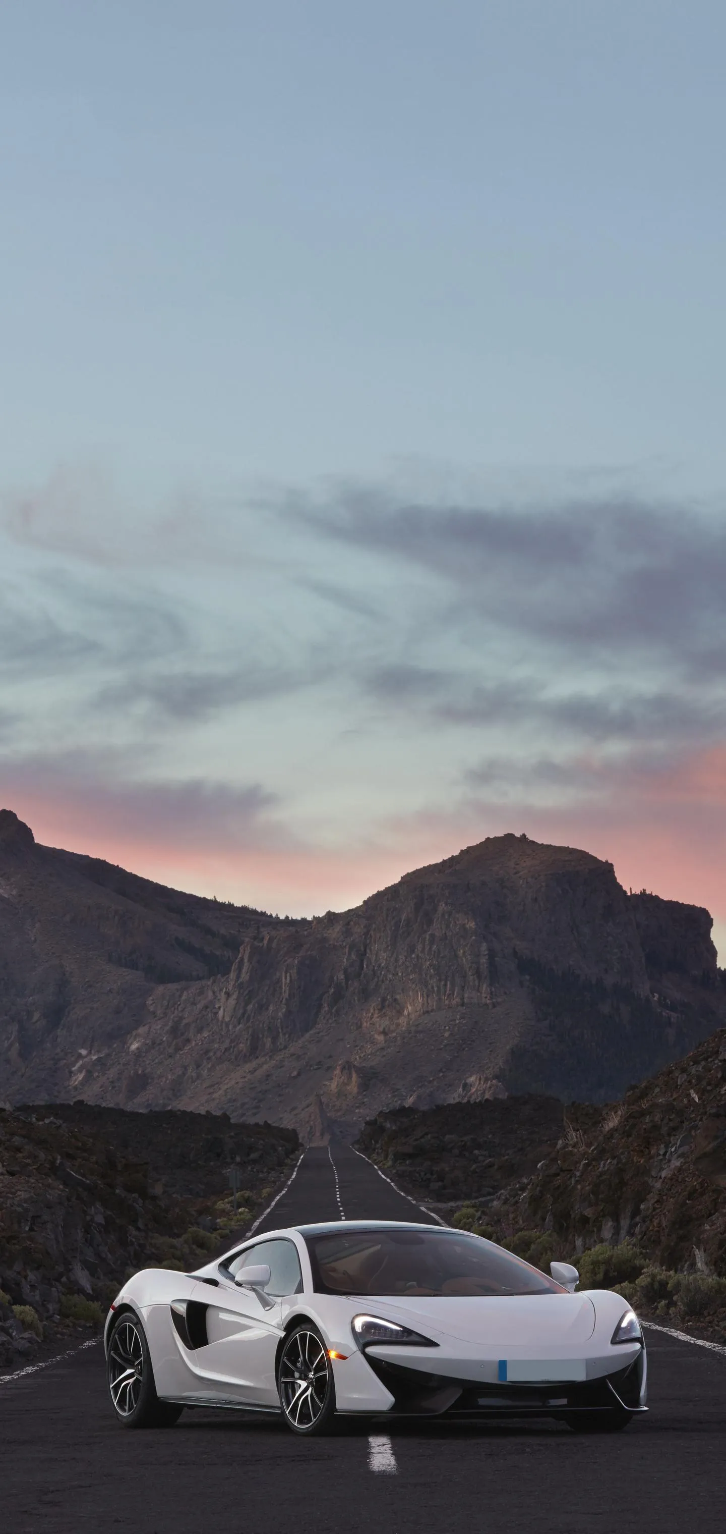 White Supercar Parked in Mountain Landscape Wallpaper