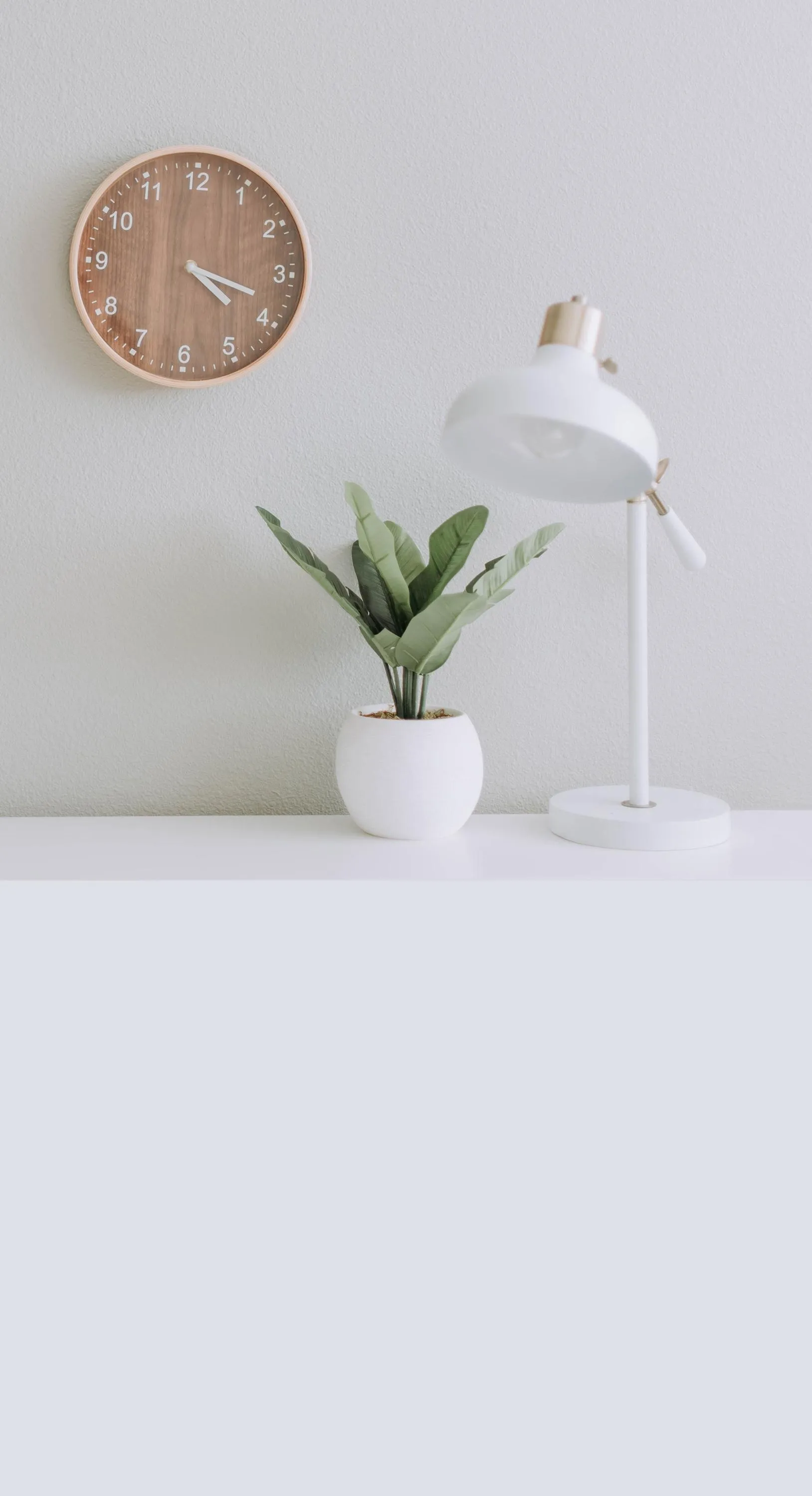 White Tabletop with Vase in Clean Minimalist Room Wallpaper