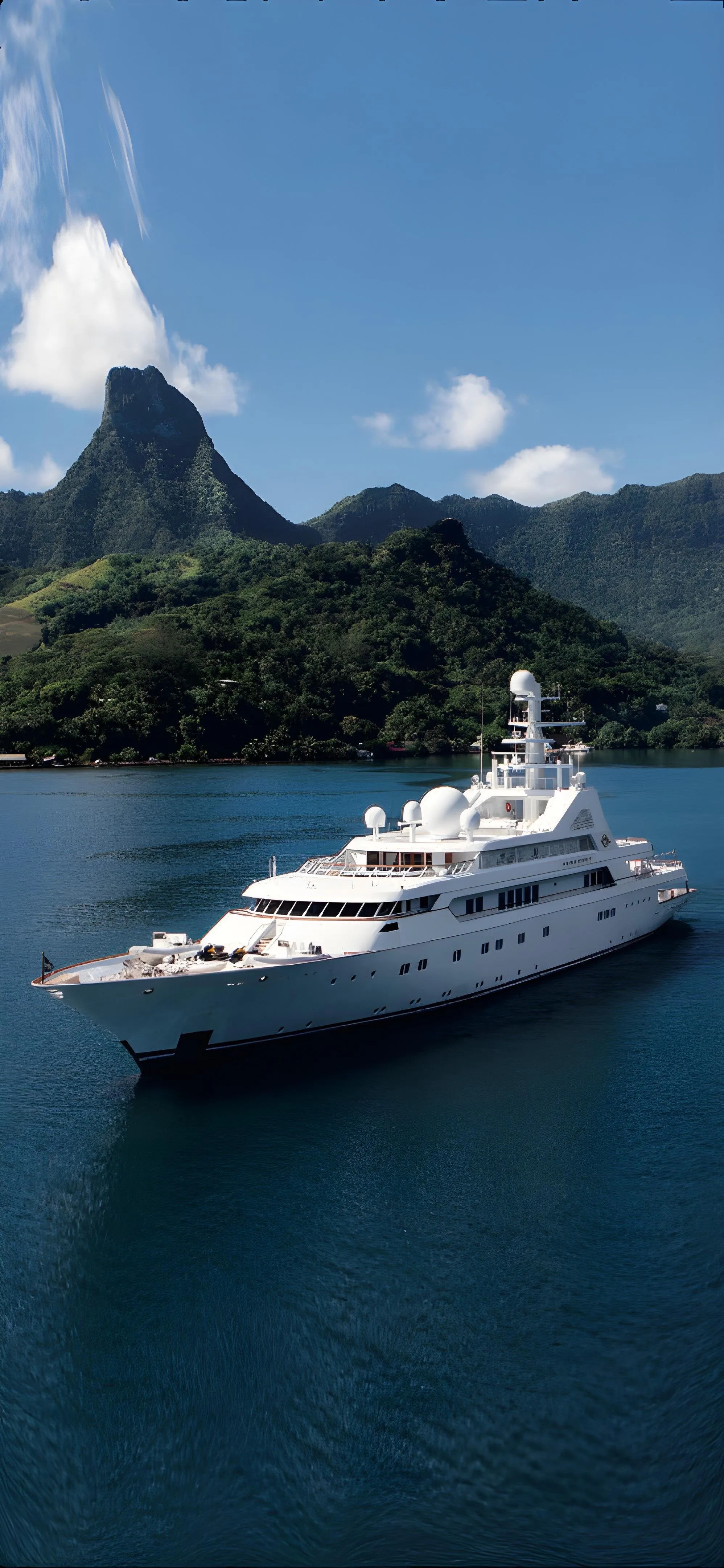 White Yacht Floating in Blue Ocean Near Island Wallpaper