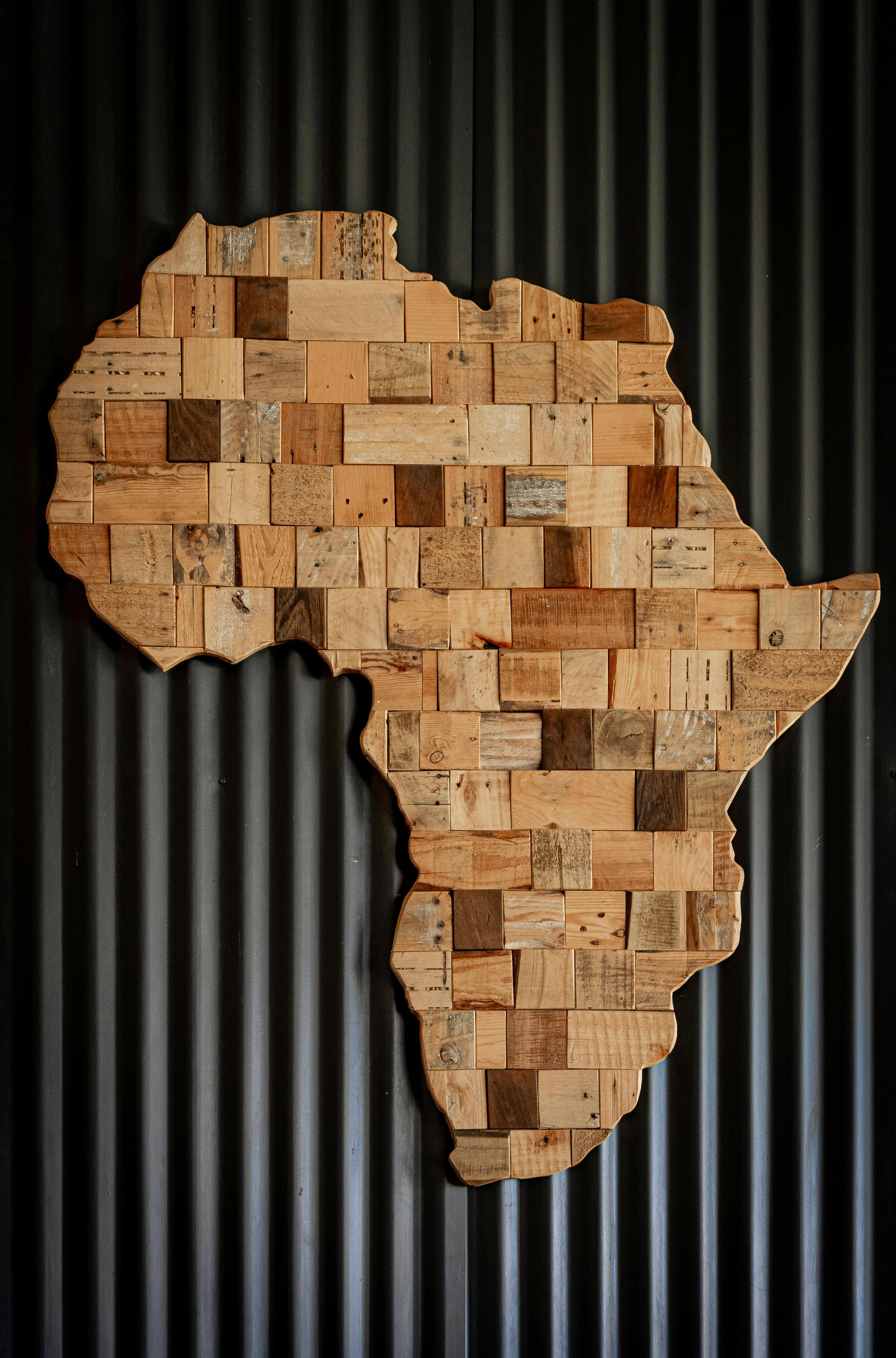 Wooden Africa Map Design on Dark Black Background Wallpaper