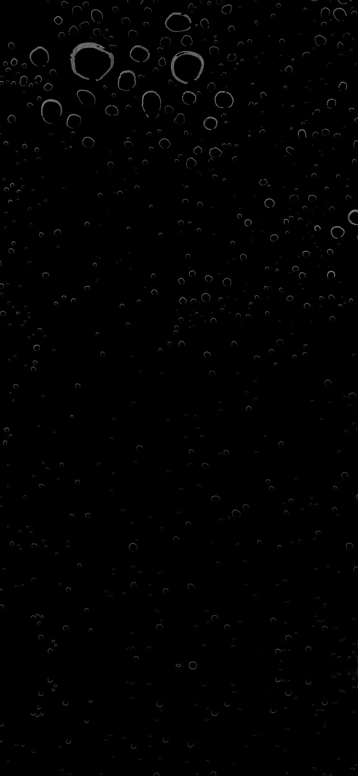Abstract black background with bubble and grain textures