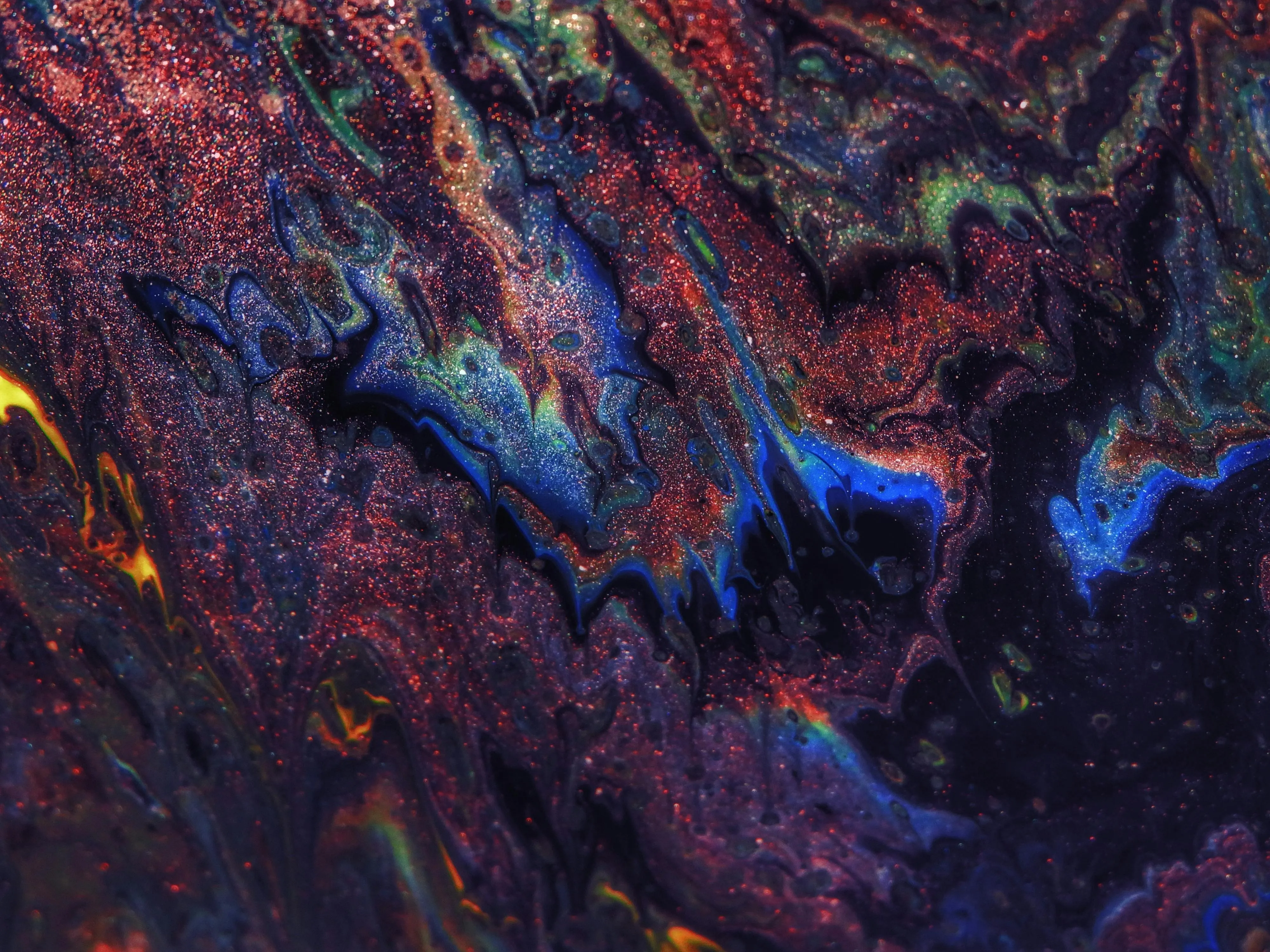 Abstract colourful liquid texture with vibrant swirls image