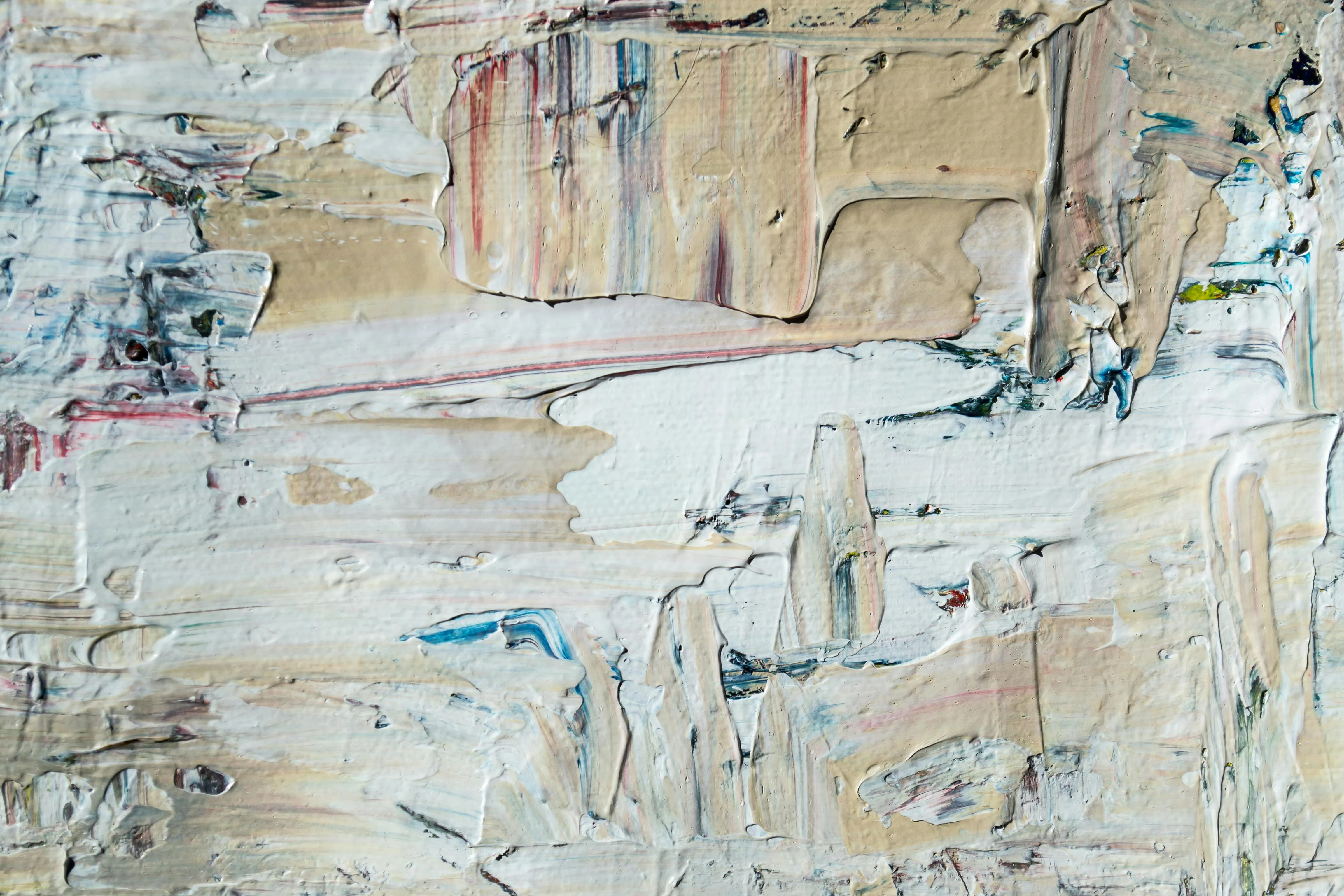 Abstract messy paint strokes on textured white canvas image