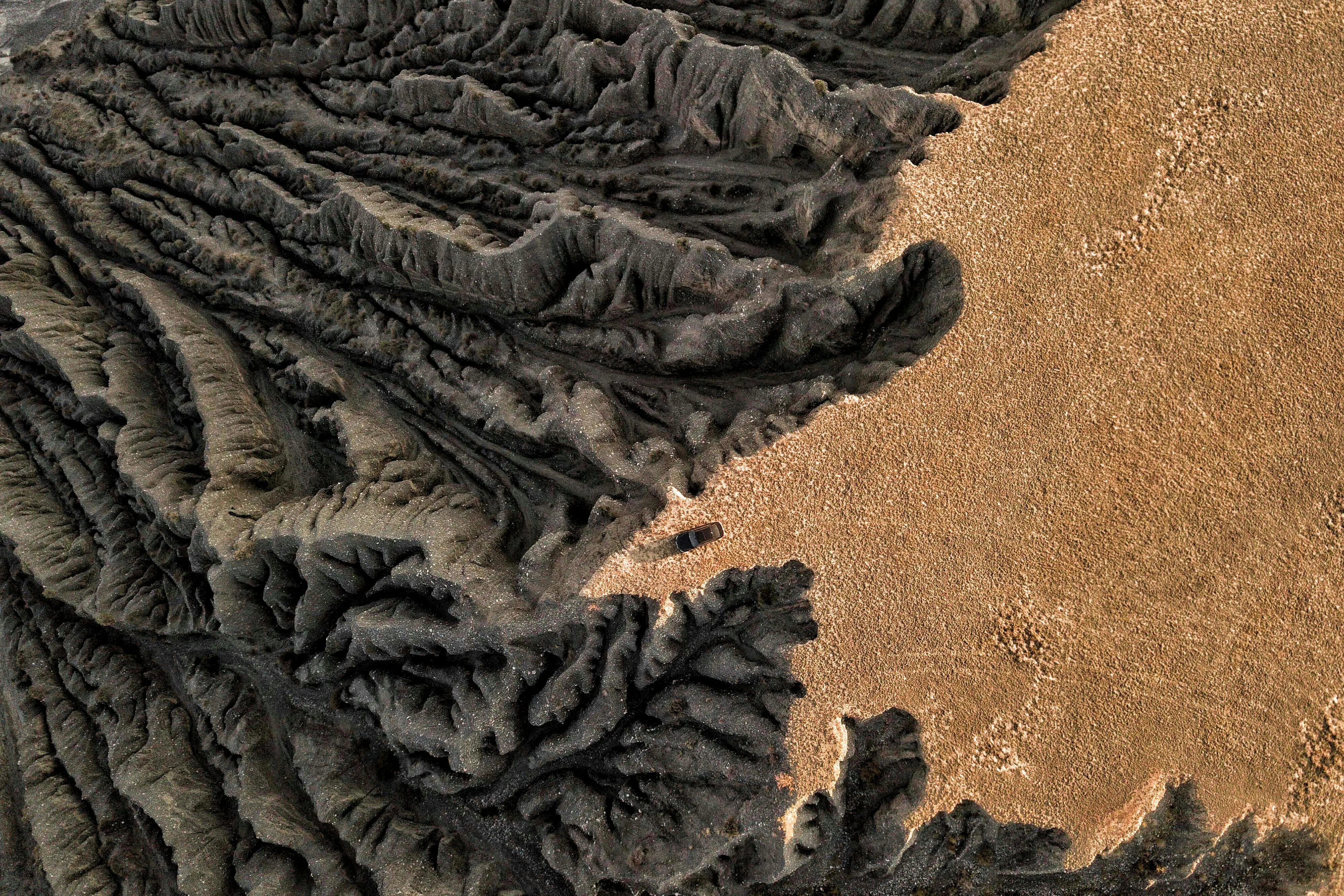 Aerial view of a dry river delta with branching patterns