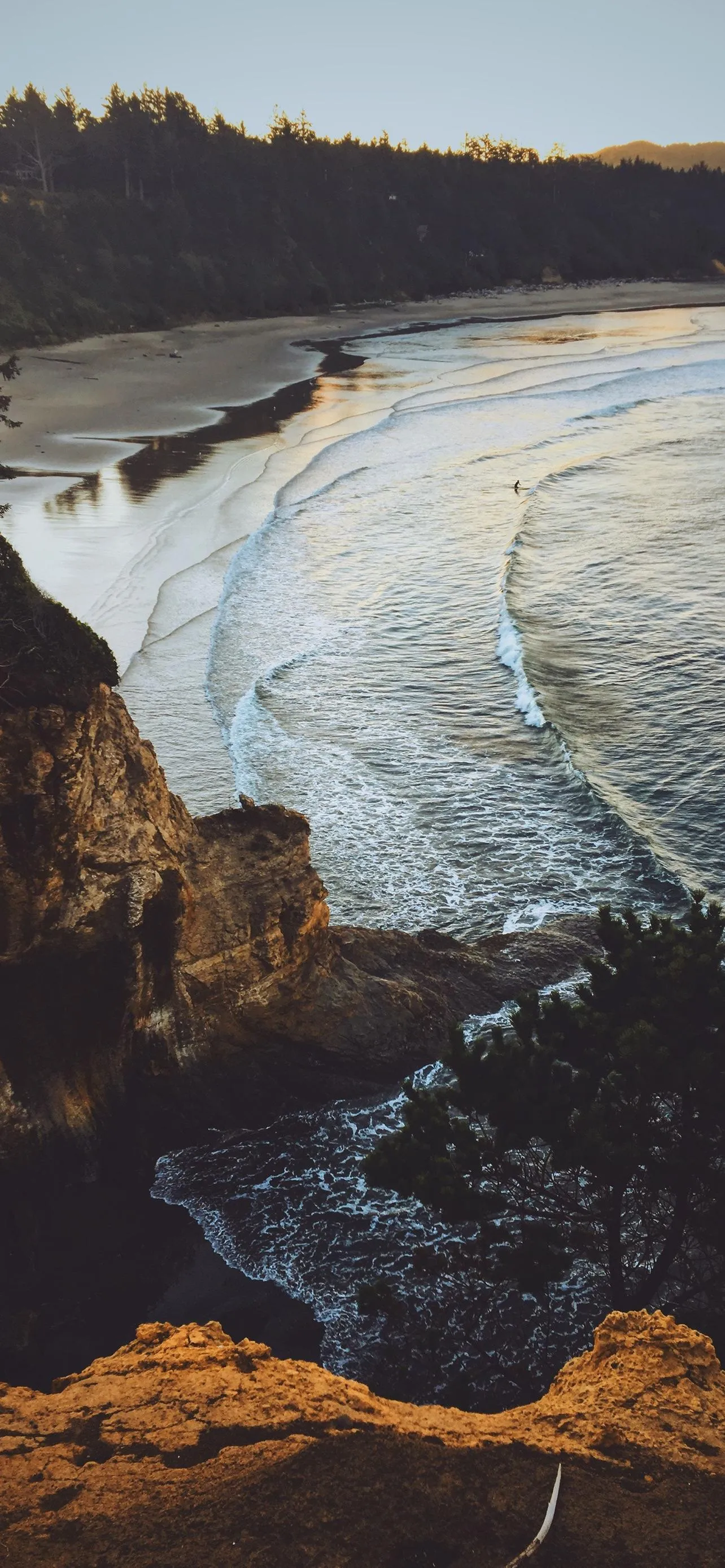 Aerial View of Curved River on Rocky Winter Coast Wallpaper