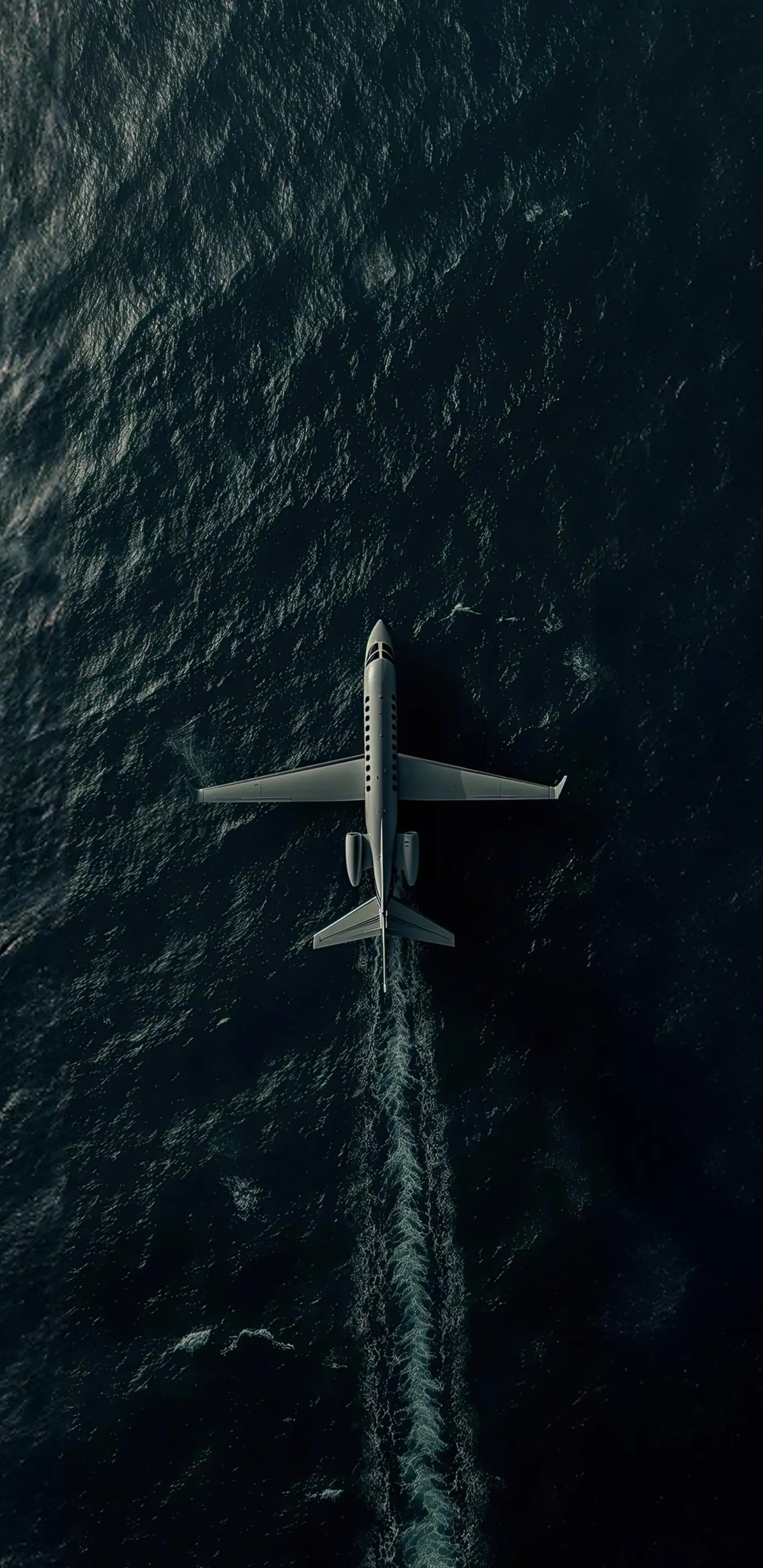 Aerial View of plane flying in Deep Blue Ocean Waters