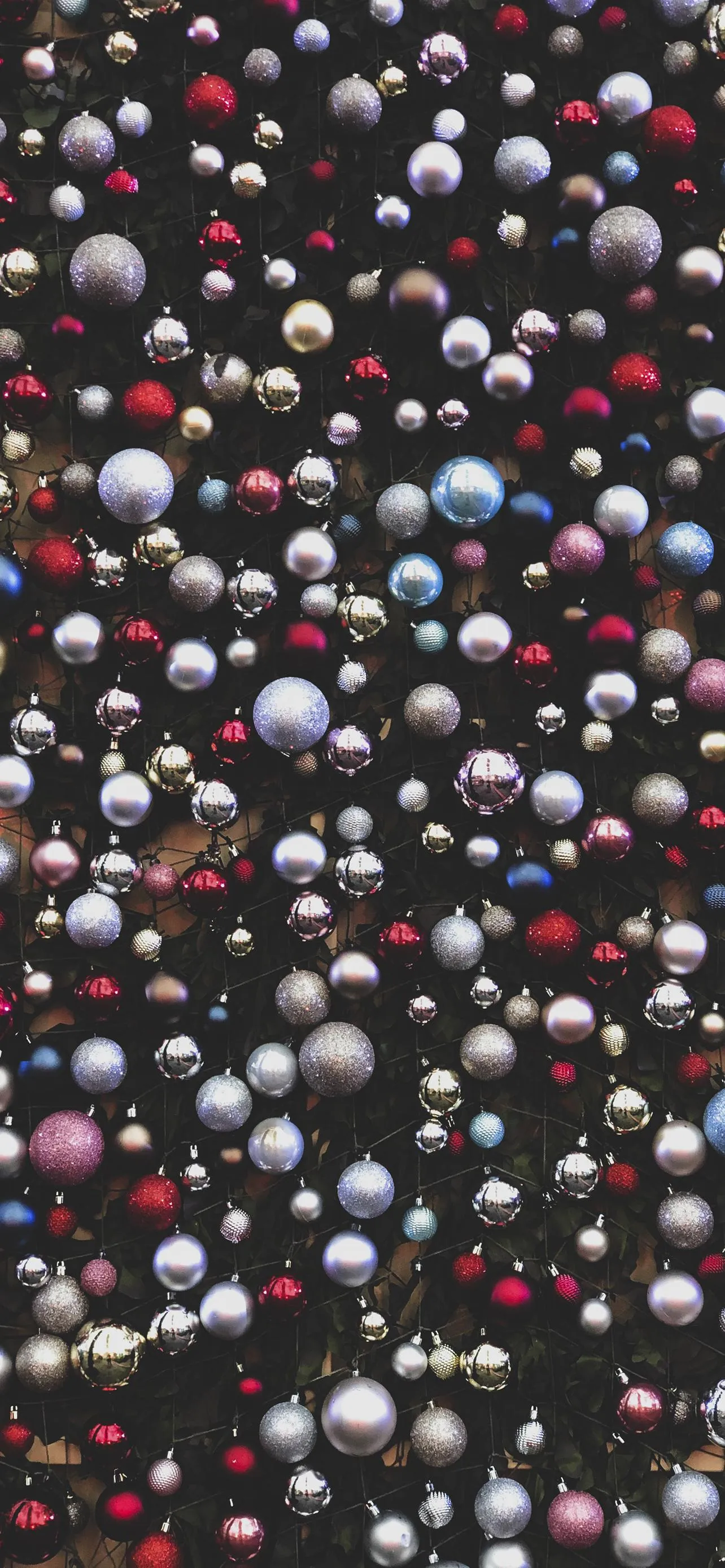 Black Background with Scattered Colorful Balls Wallpaper