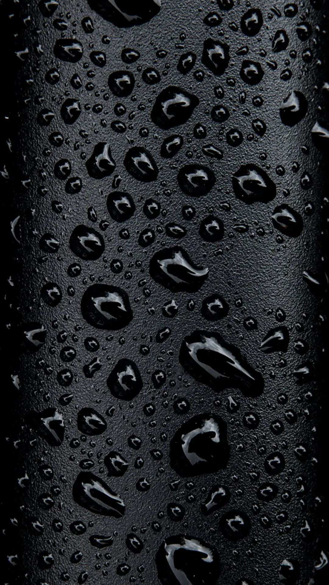 Black surface with realistic water droplets in 4k quality
