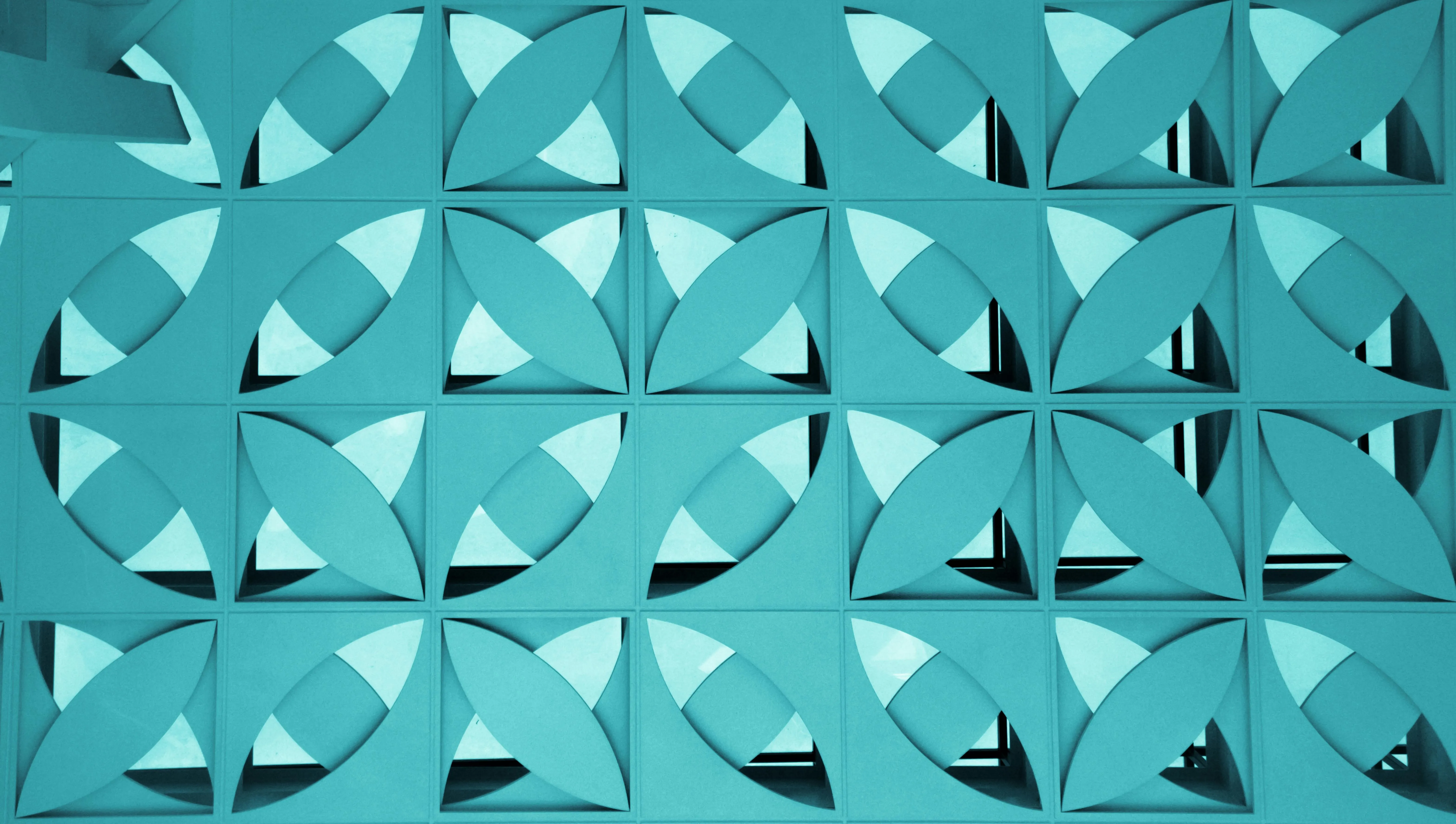 Blue geometric patterned wall art with shadows Wallpaper