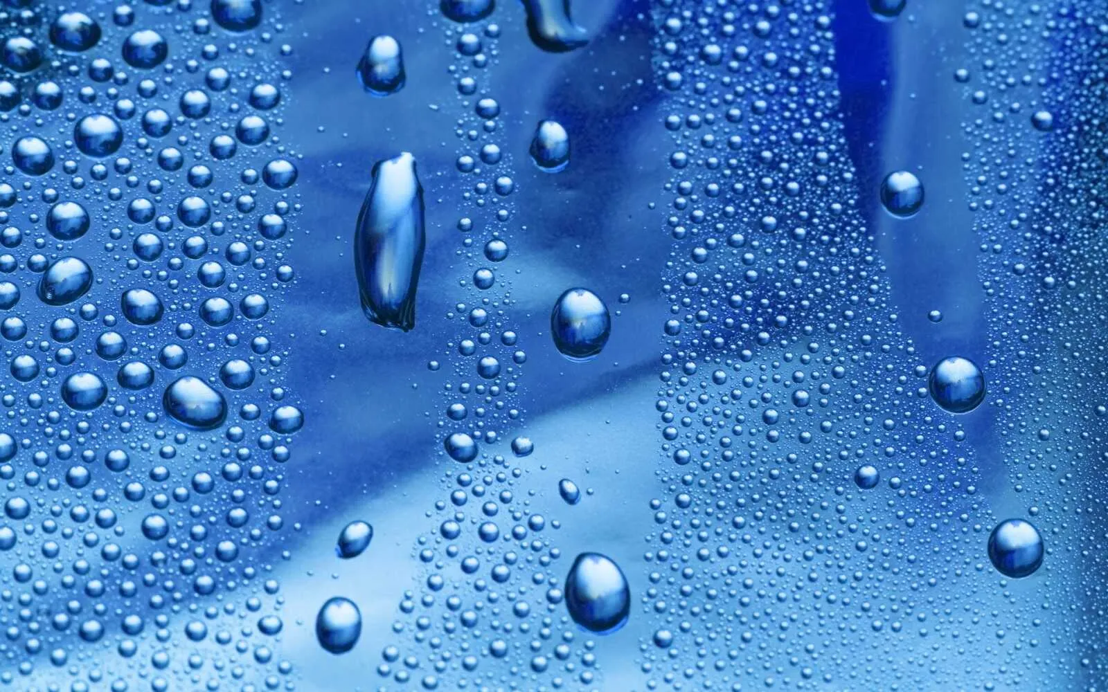 Blue water drops background with realistic bubble texture