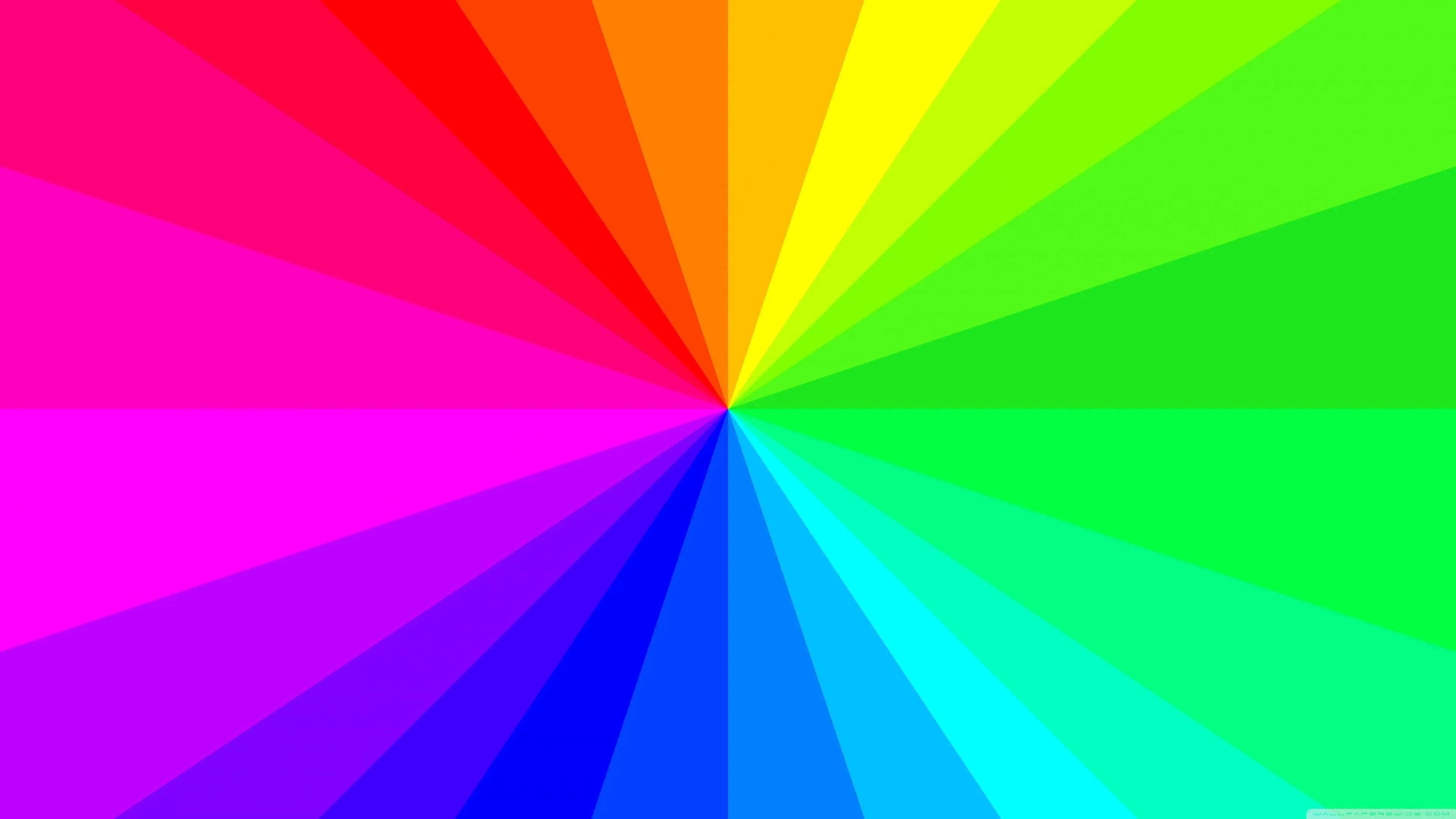 Bright burst with rainbow gradient colour wheel Wallpaper