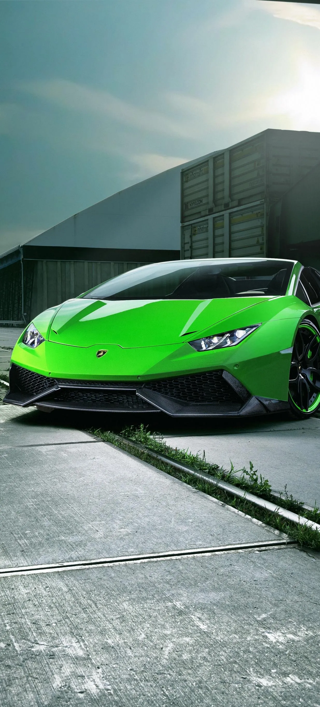 Bright Green Sports Car Parked in Modern Urban Environment