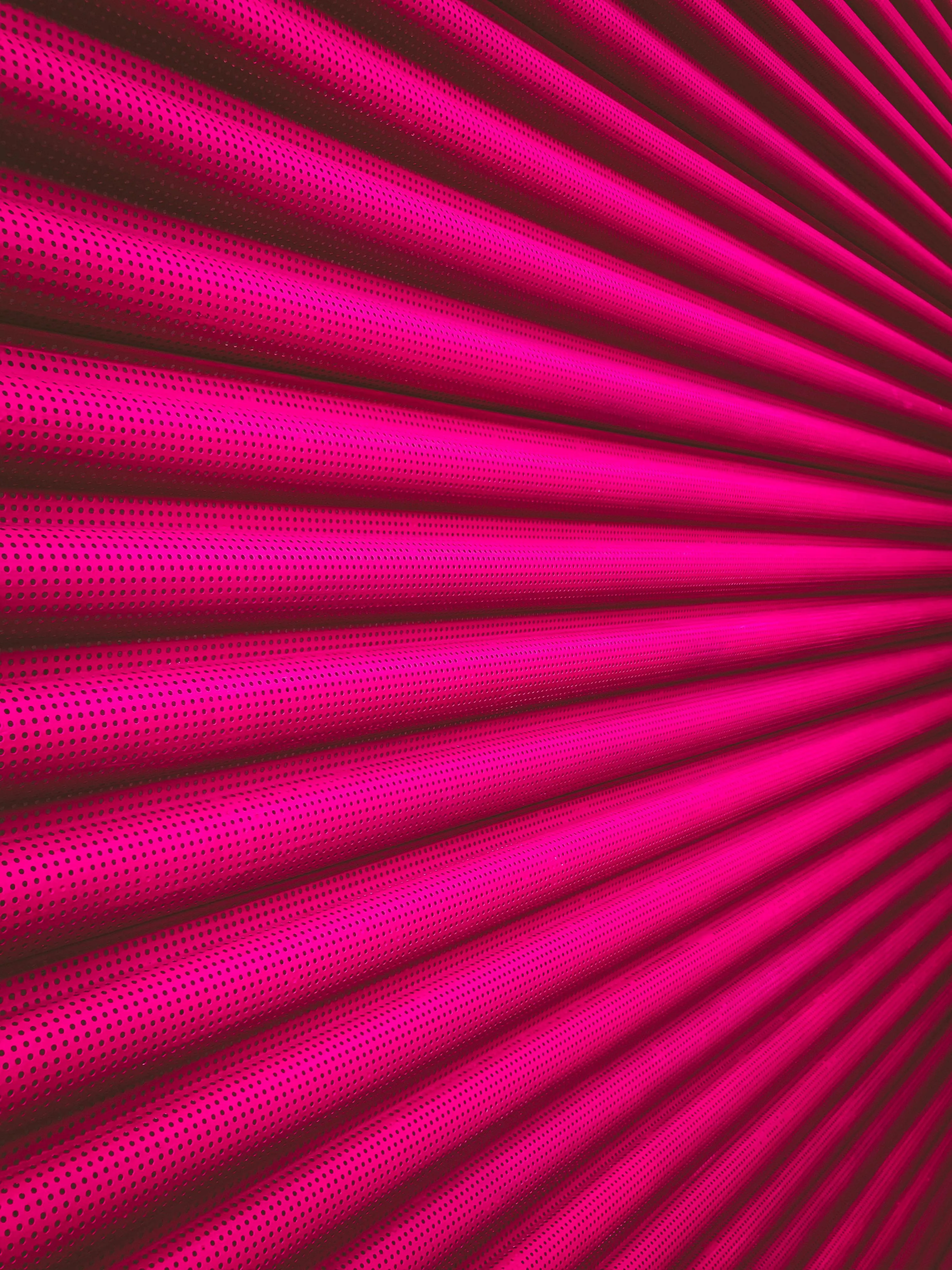 Bright pink colour radial lines pattern on black Wallpaper