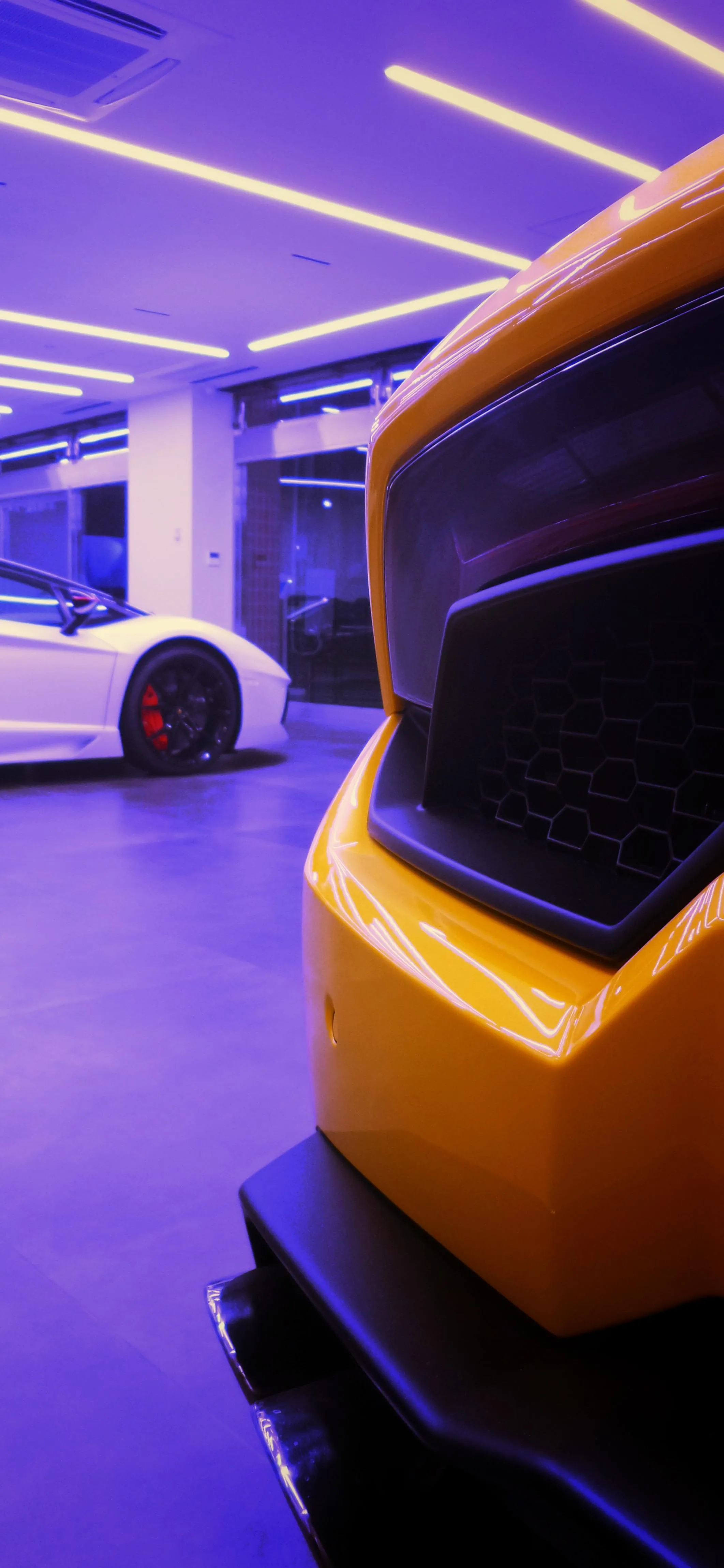 Bright Yellow Sports Car in Purple Neon Garage Scene