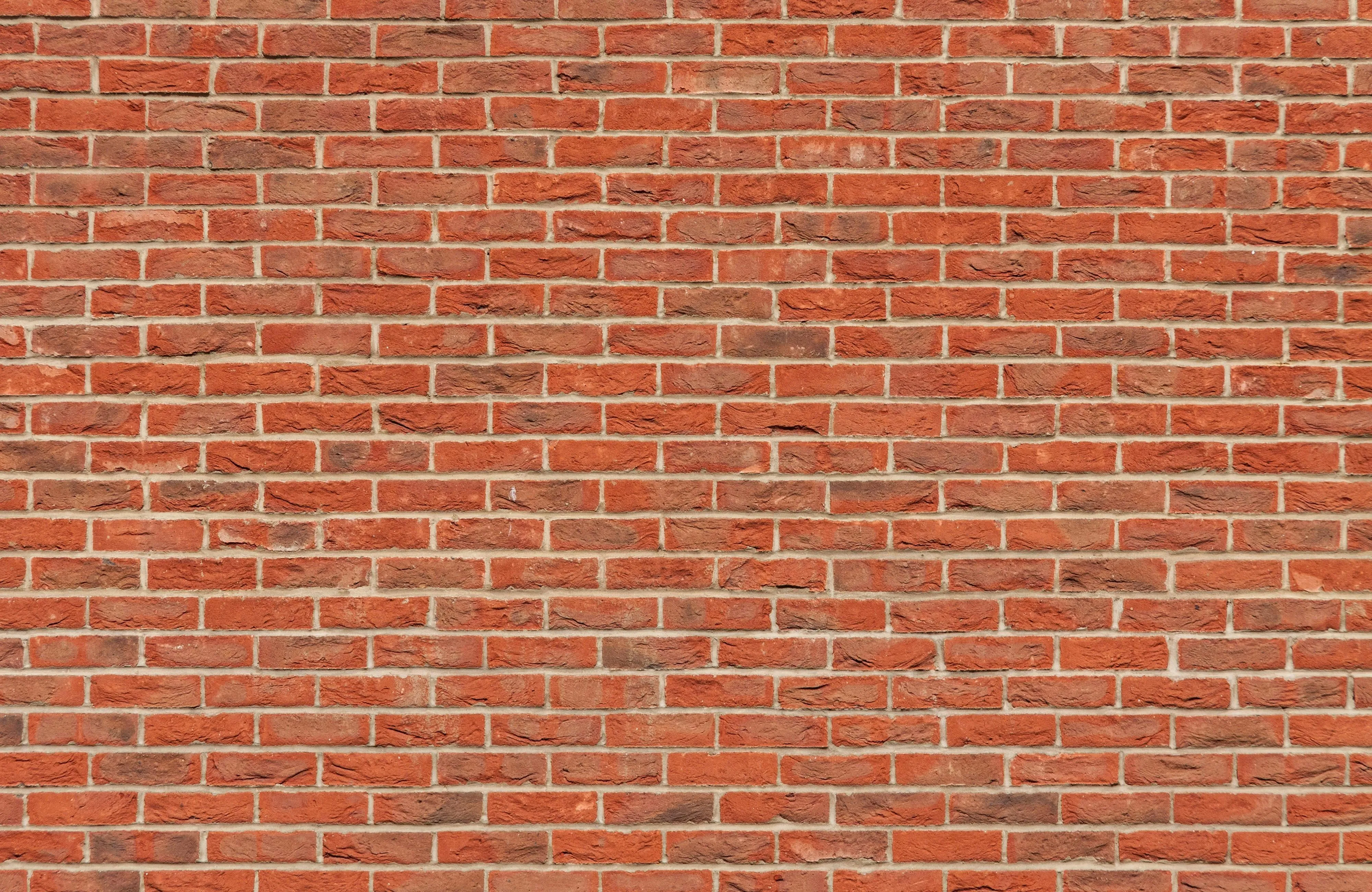 Classic red brick wall texture with rustic look Wallpaper