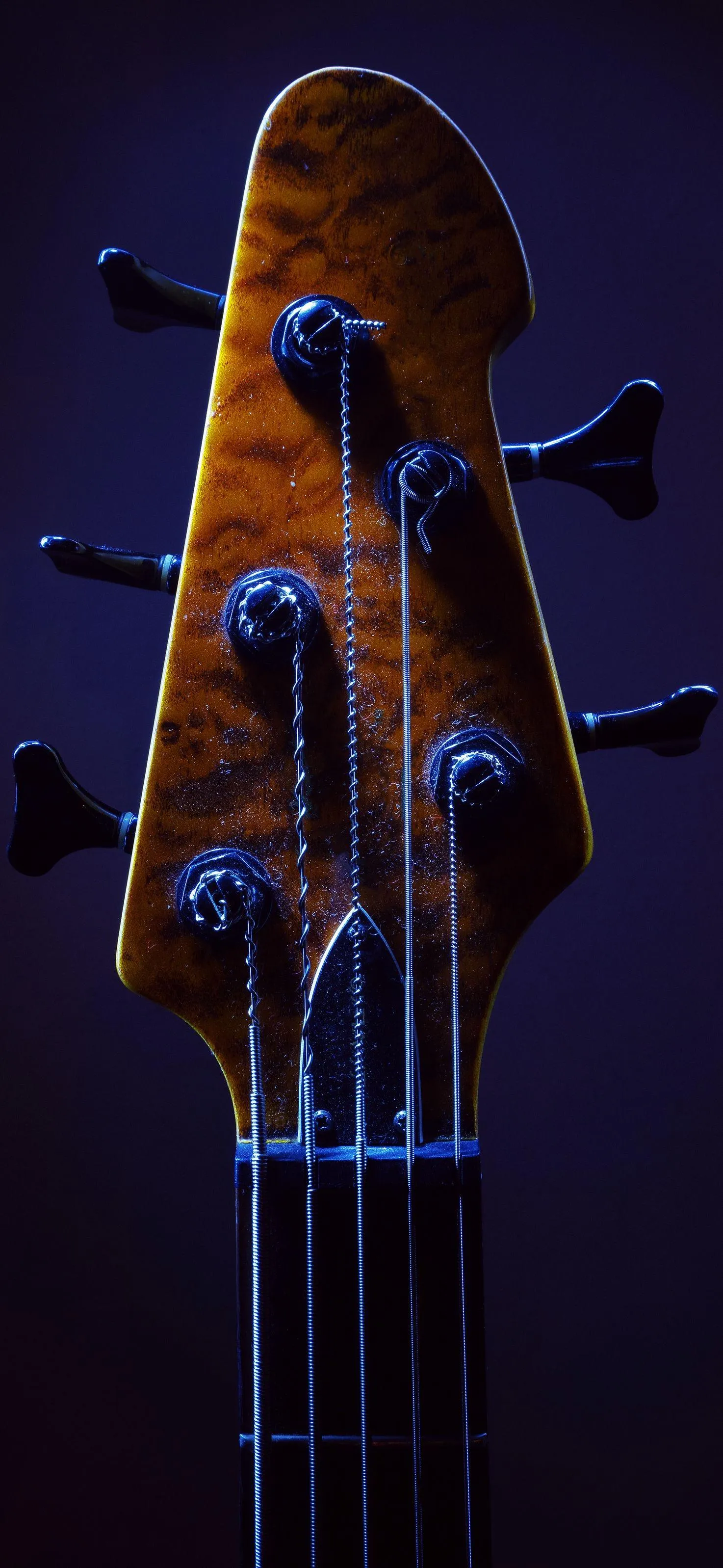 Close up of guitar headstock with dark background Wallpaper
