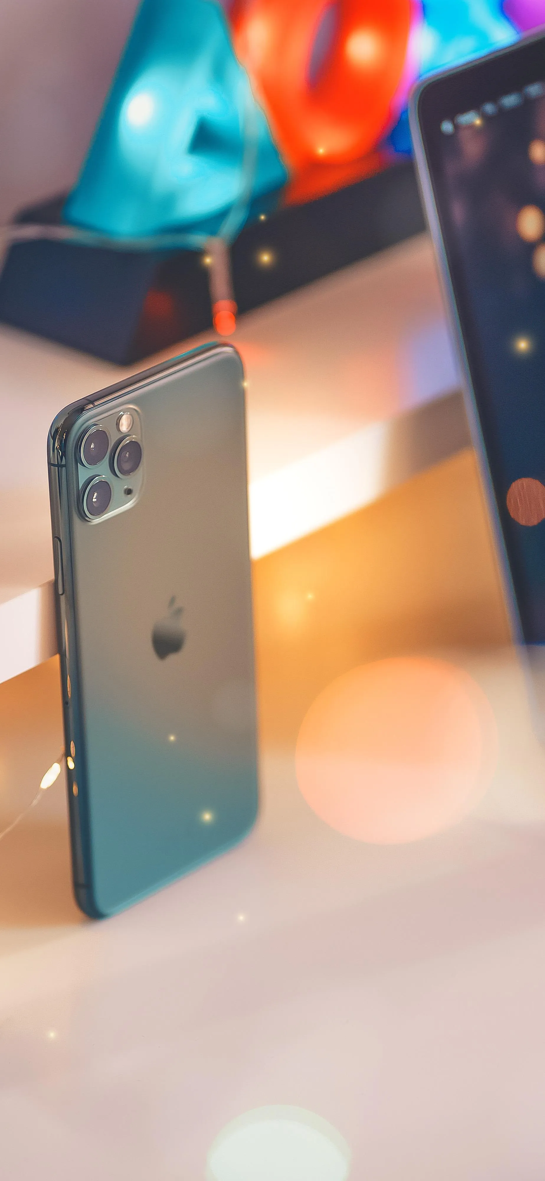 Close Up of iPhones in Bokeh Light Modern Background