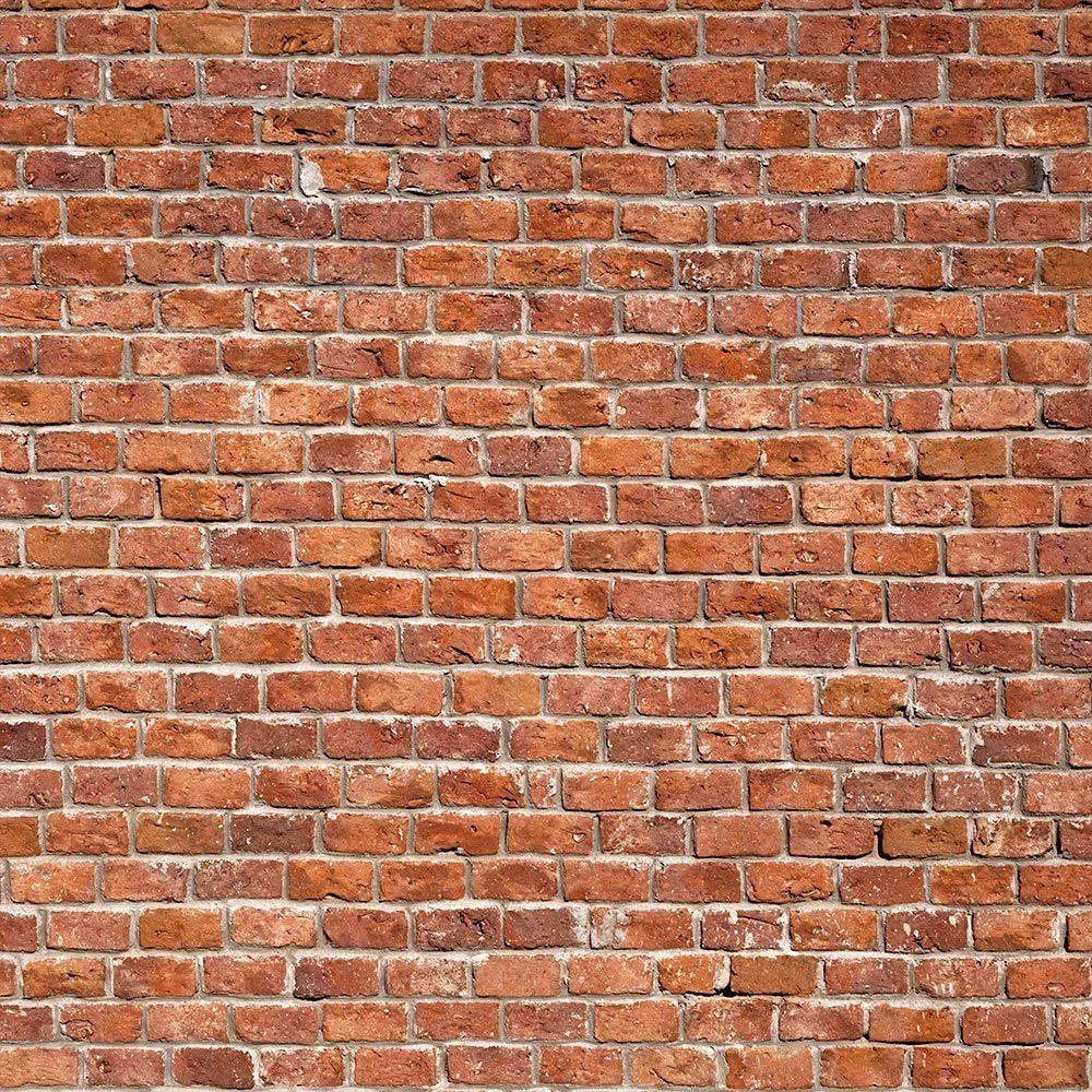 Close up of red brick wall texture with natural weathering