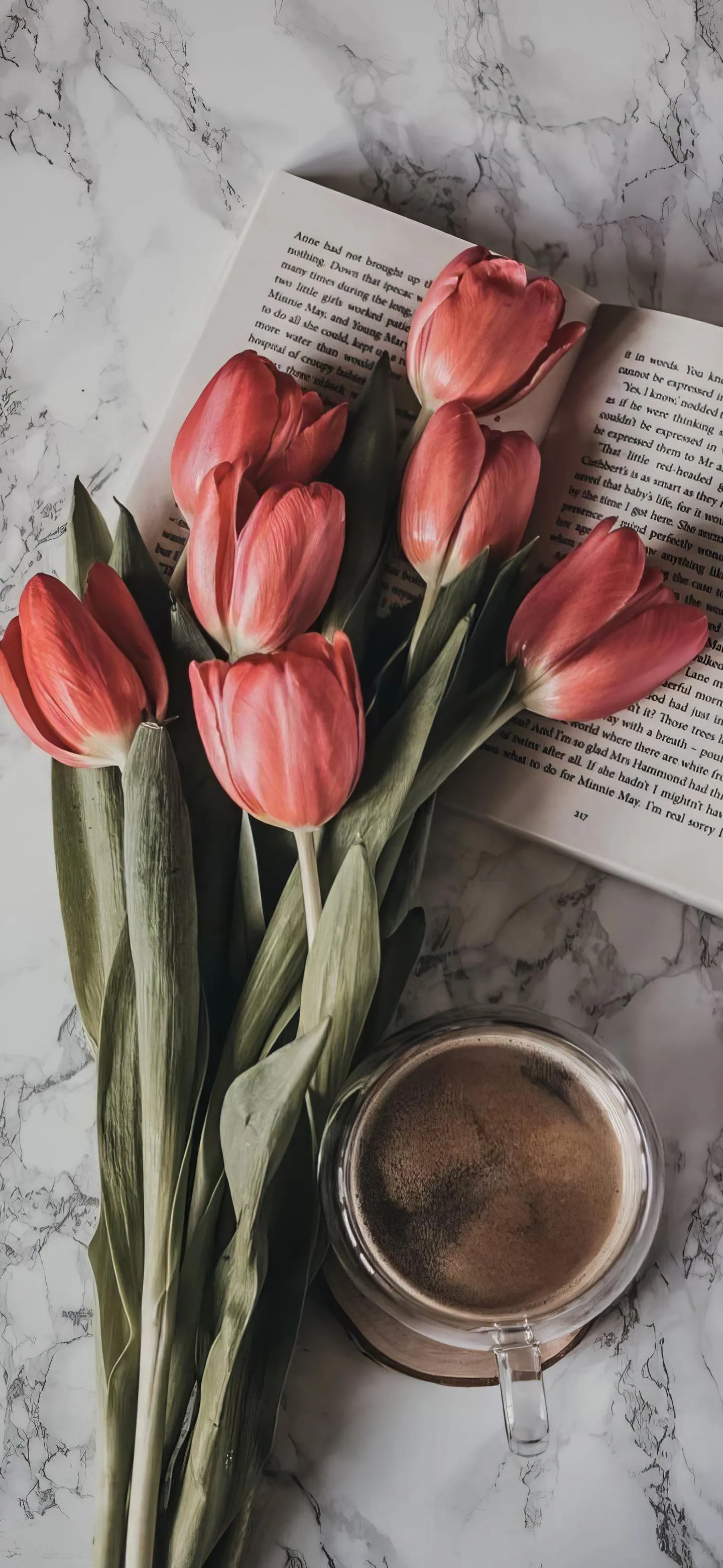 Coffee and Pink Tulips on a Gray Fabric Background Wallpaper