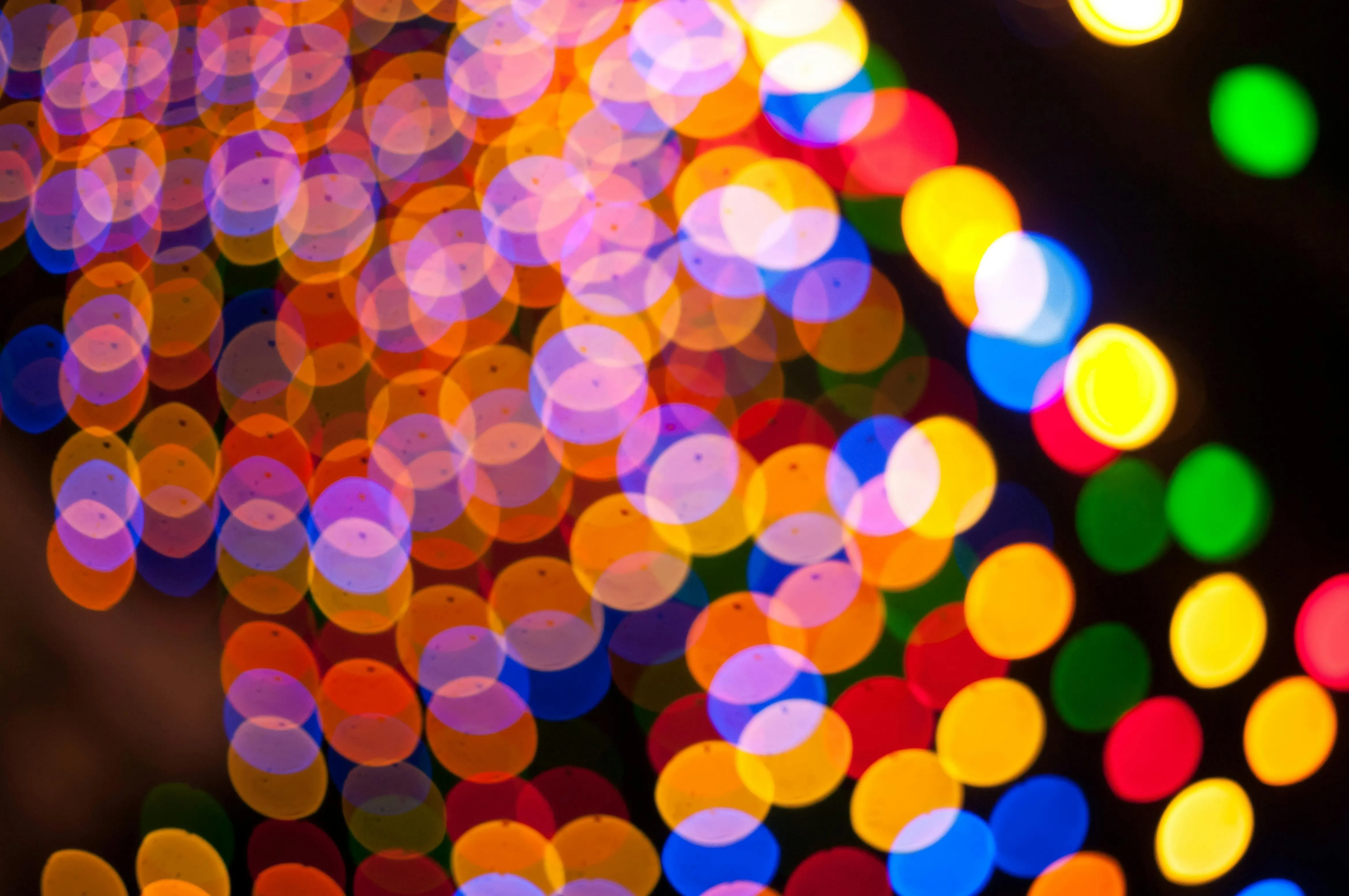 Colourful bokeh lights in vibrant tones free 4K Wallpaper
