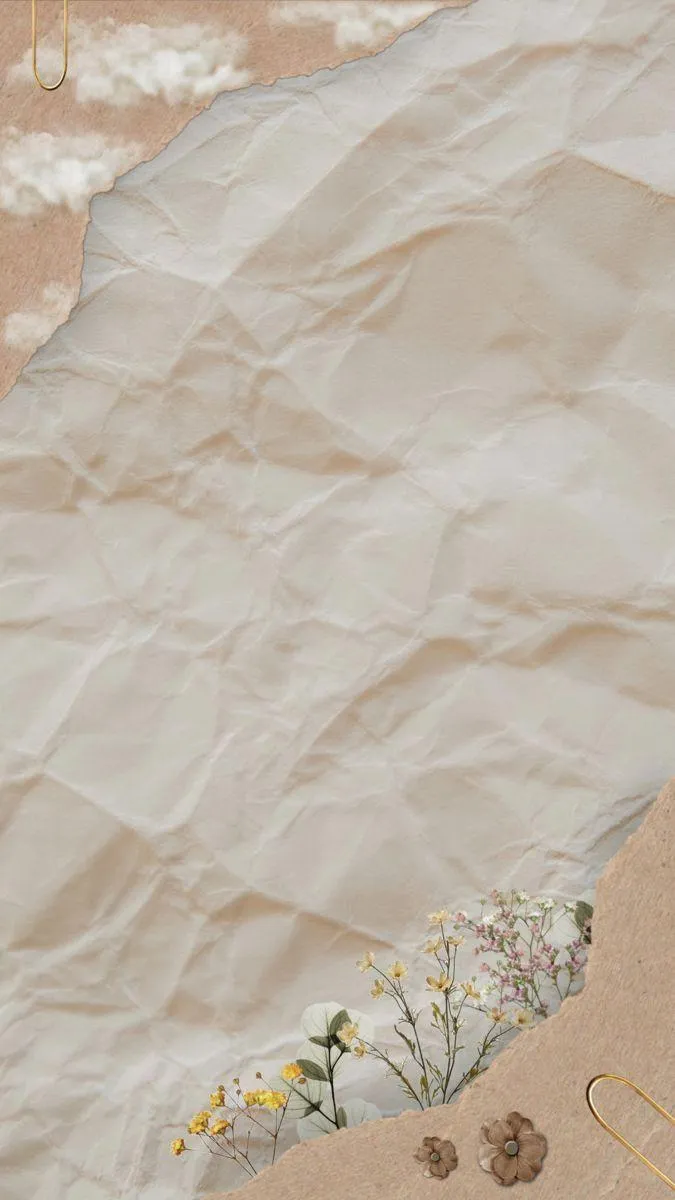 Crumpled paper background with floral print on the bottom