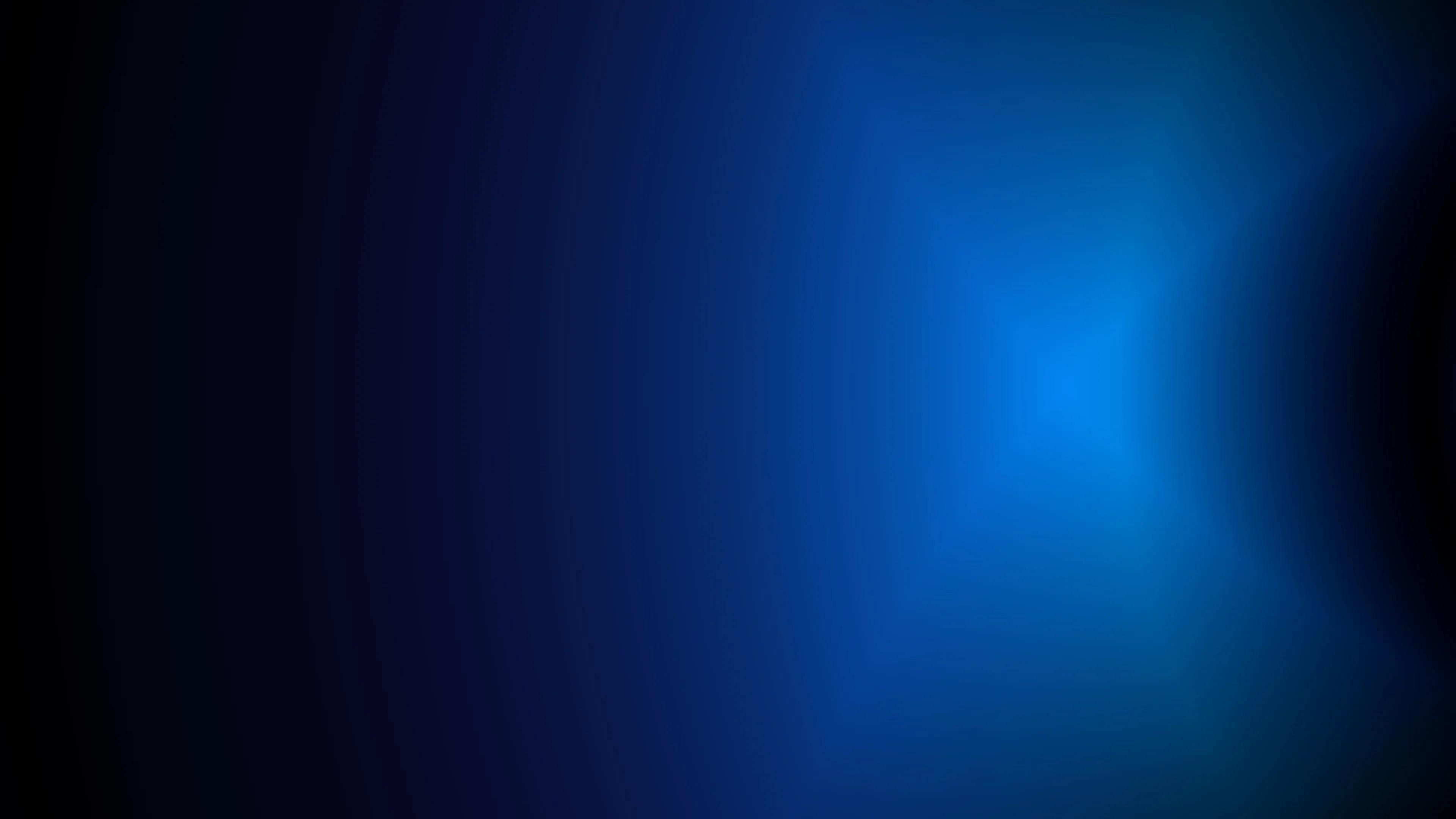 Dark blue gradient background with light flare Wallpaper