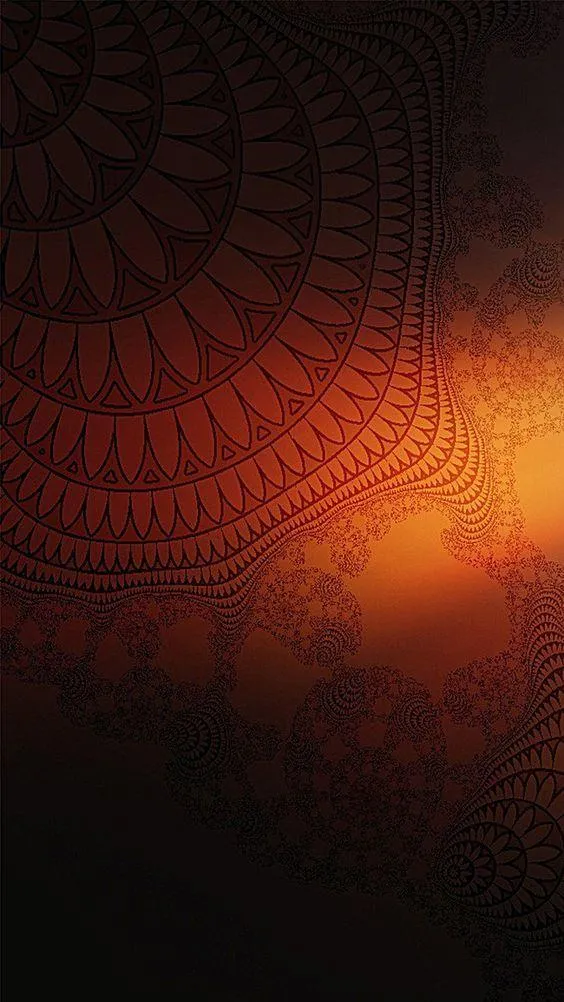 Dark mandala pattern glowing with warm orange highlights HD