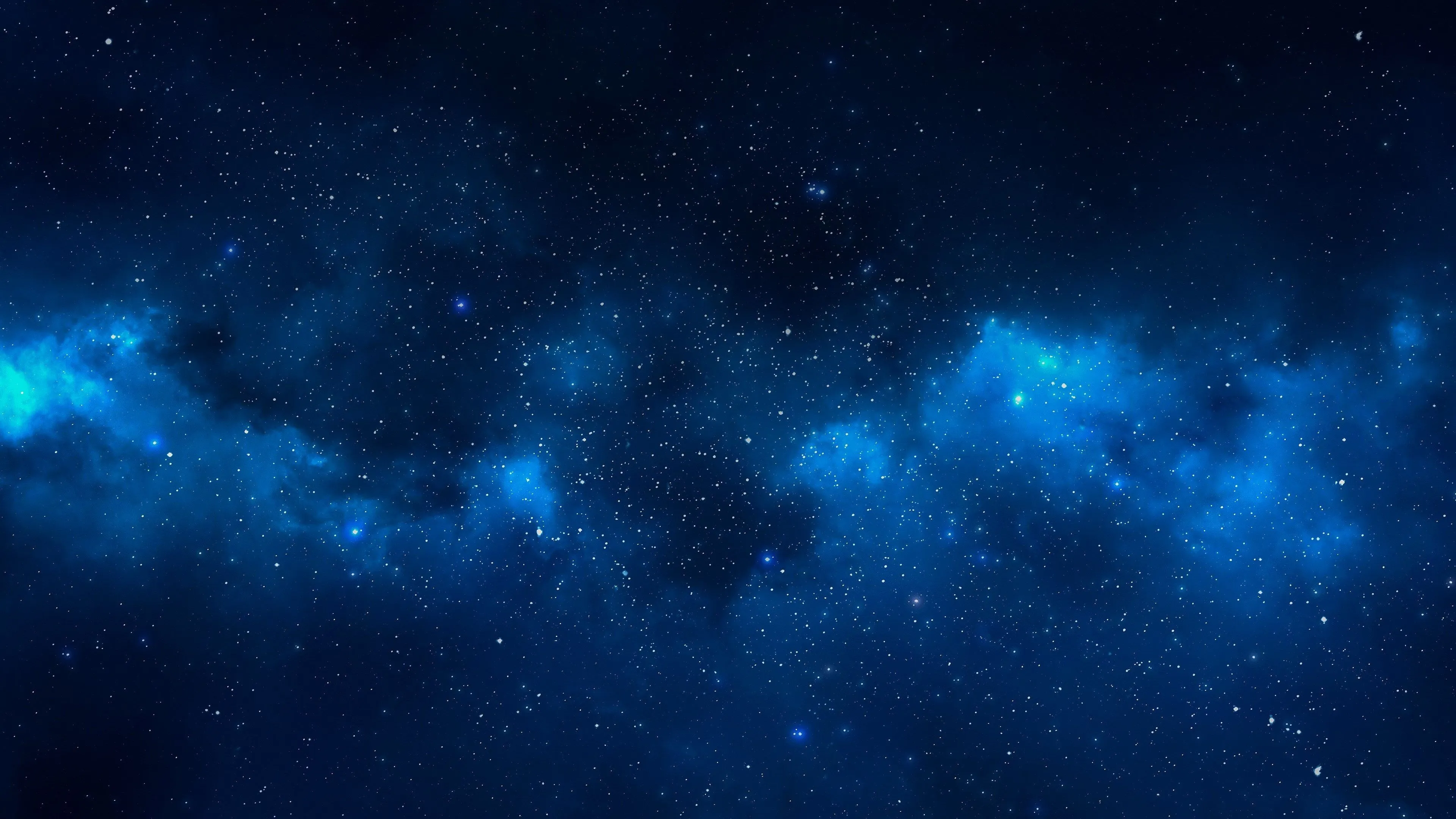Deep space starry sky with bright blue cosmic cloud pattern