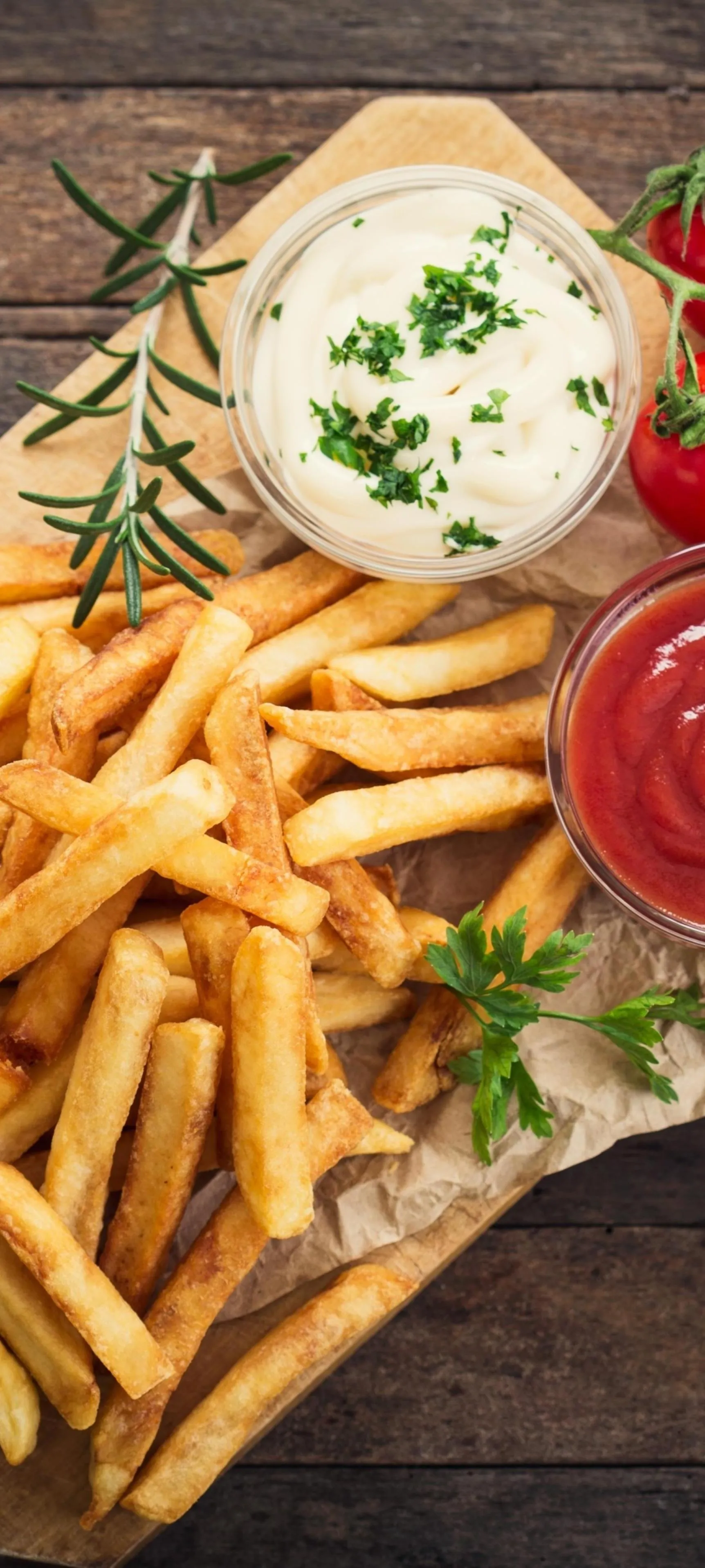 Delicious French Fries with Tomatoes and Herbs Wallpaper