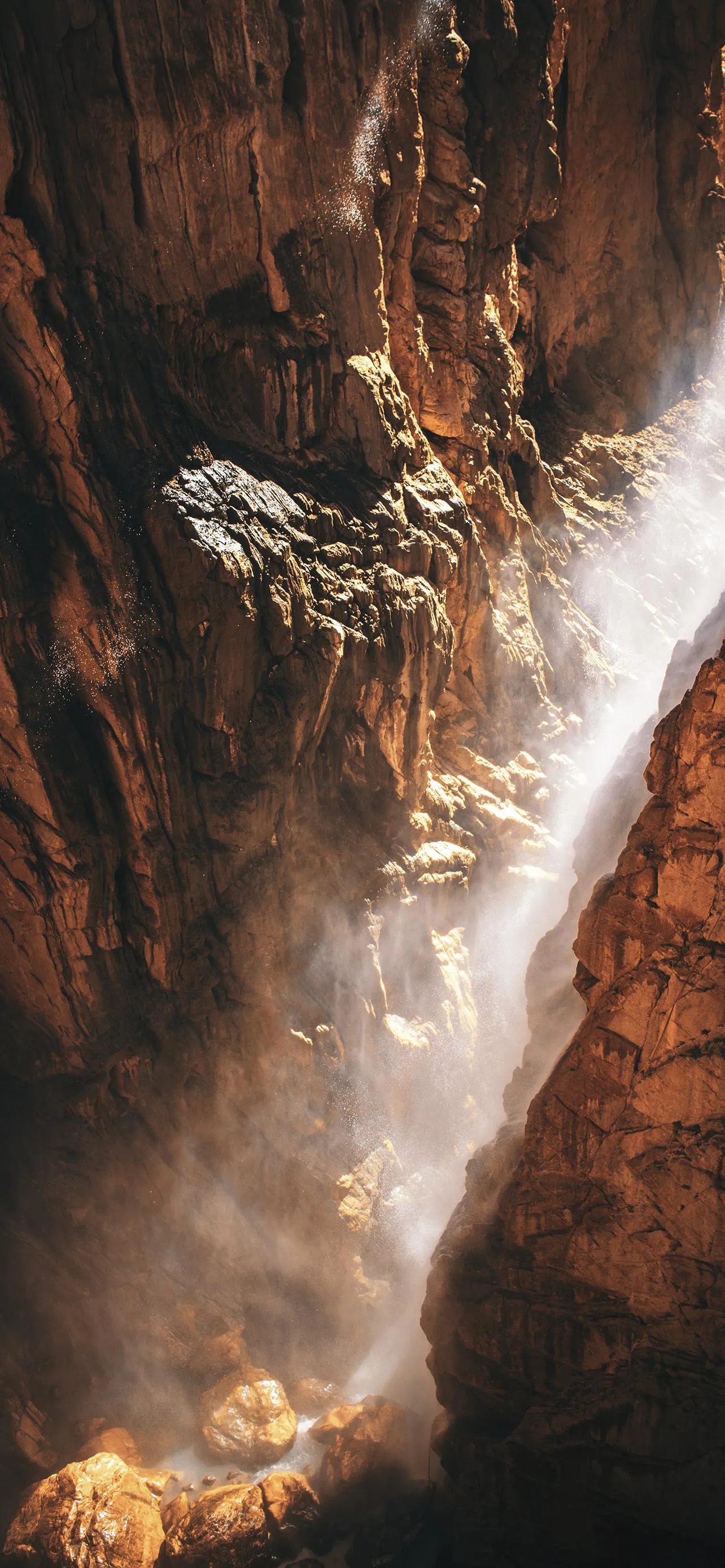 Epic Waterfall Crashing Down Cliff in Forest Wilderness