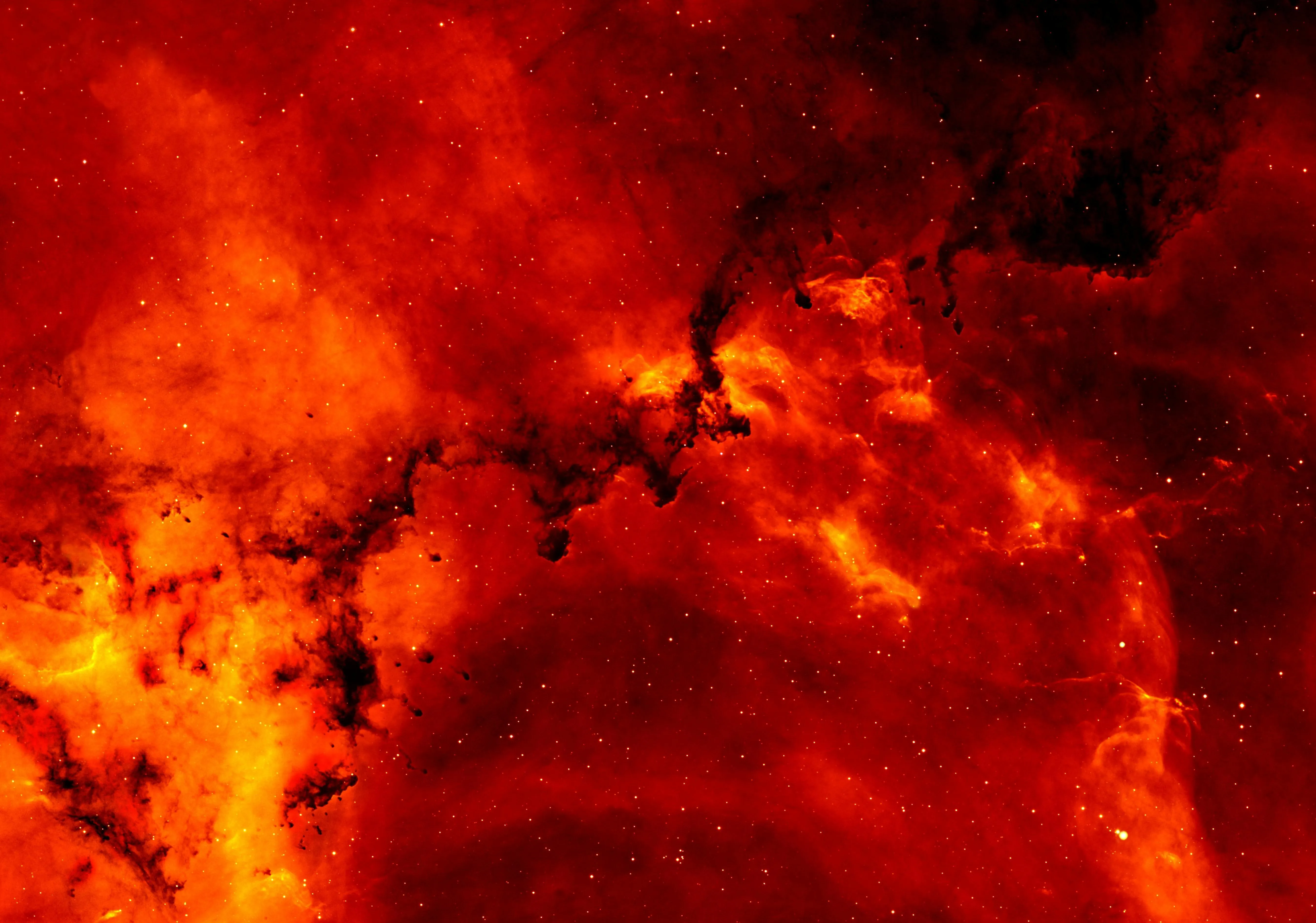 Fiery orange and red abstract cosmic nebula Background image