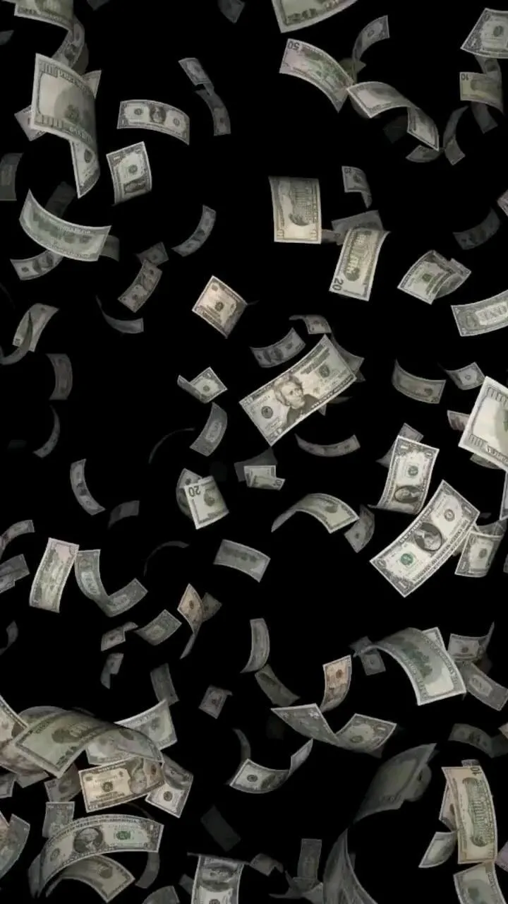 Floating dollar bills on a dark background free Wallpaper