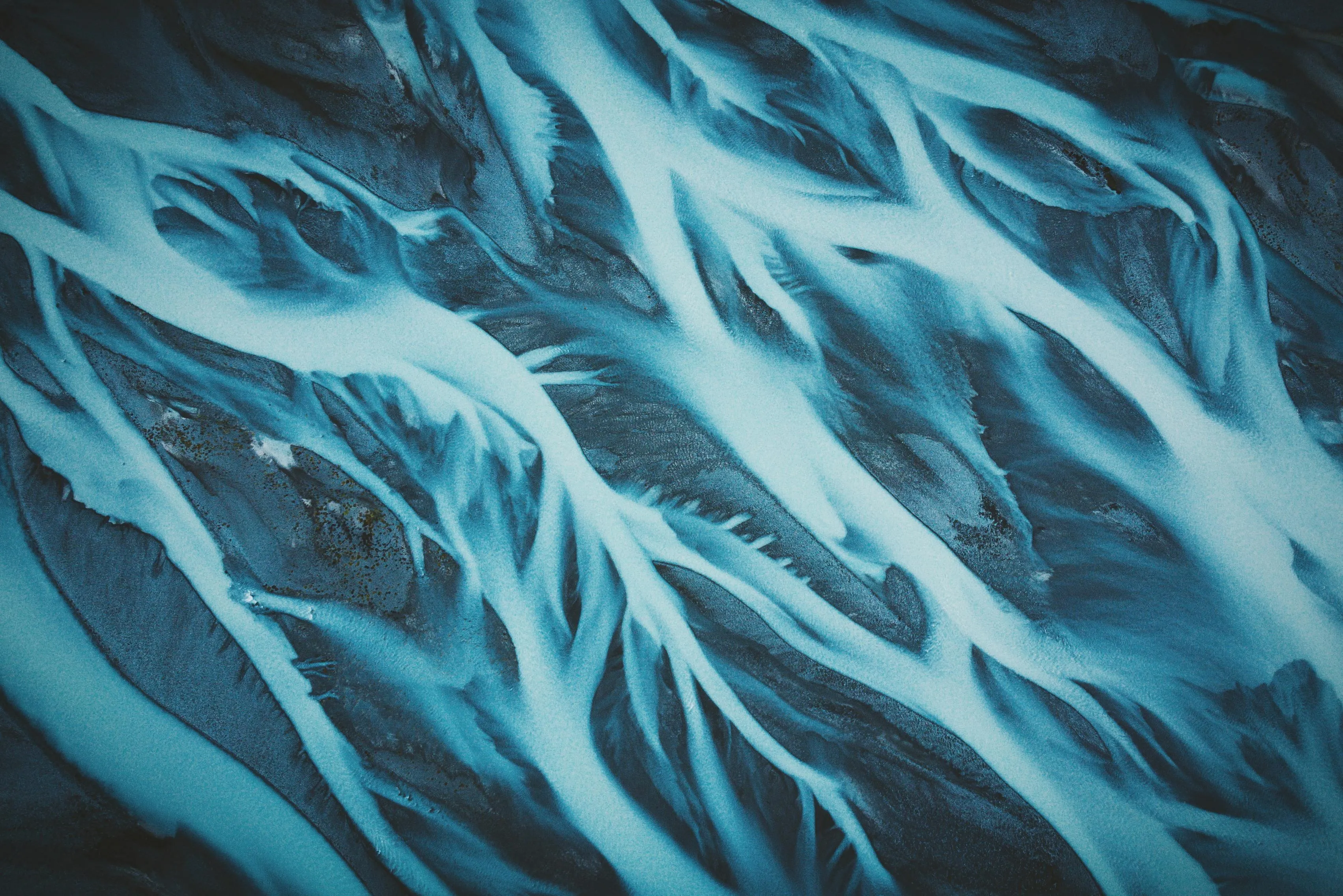 Flowing blue abstract pattern representing waves Wallpaper