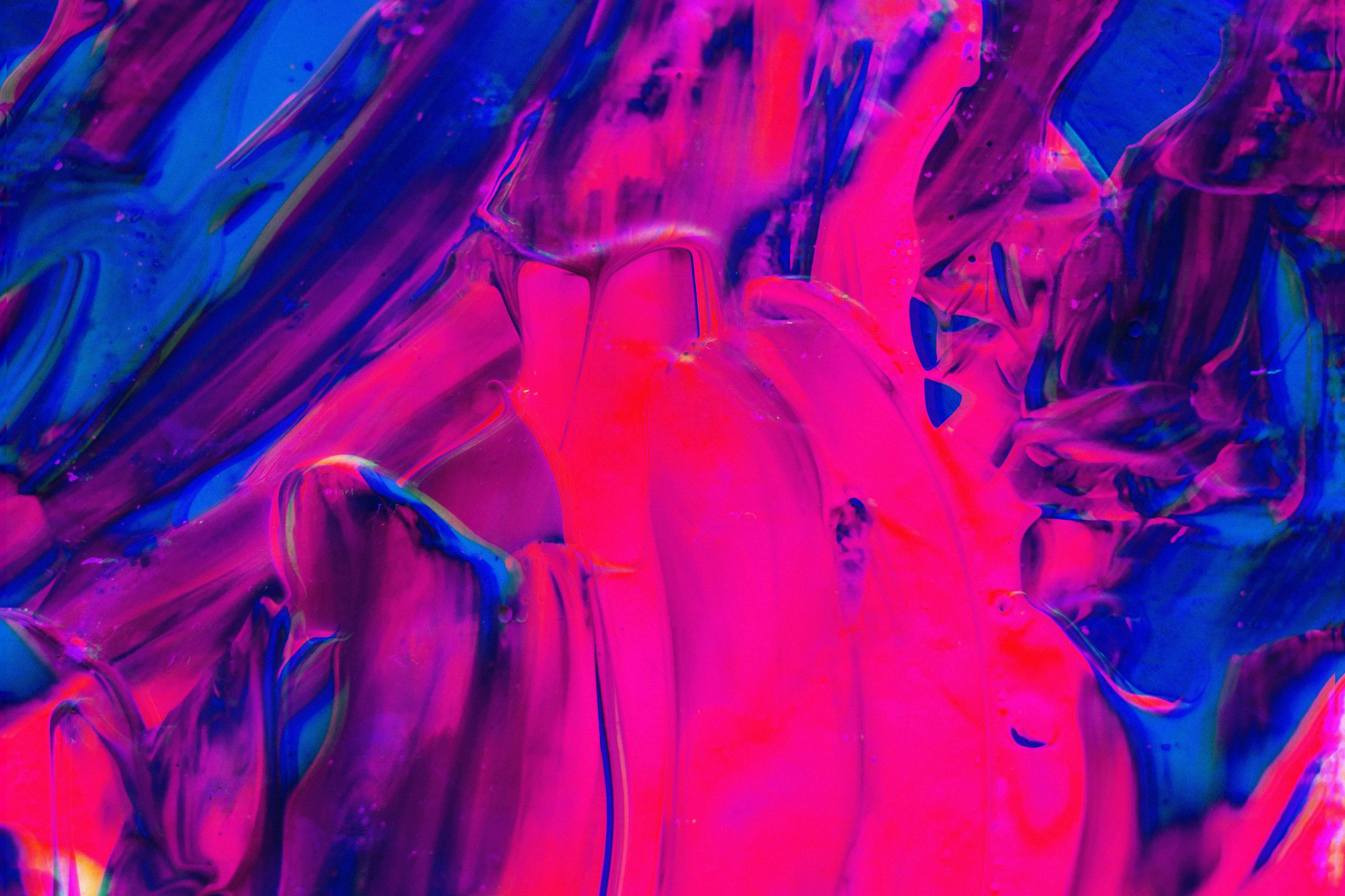Glossy pink and blue paint texture background Wallpaper