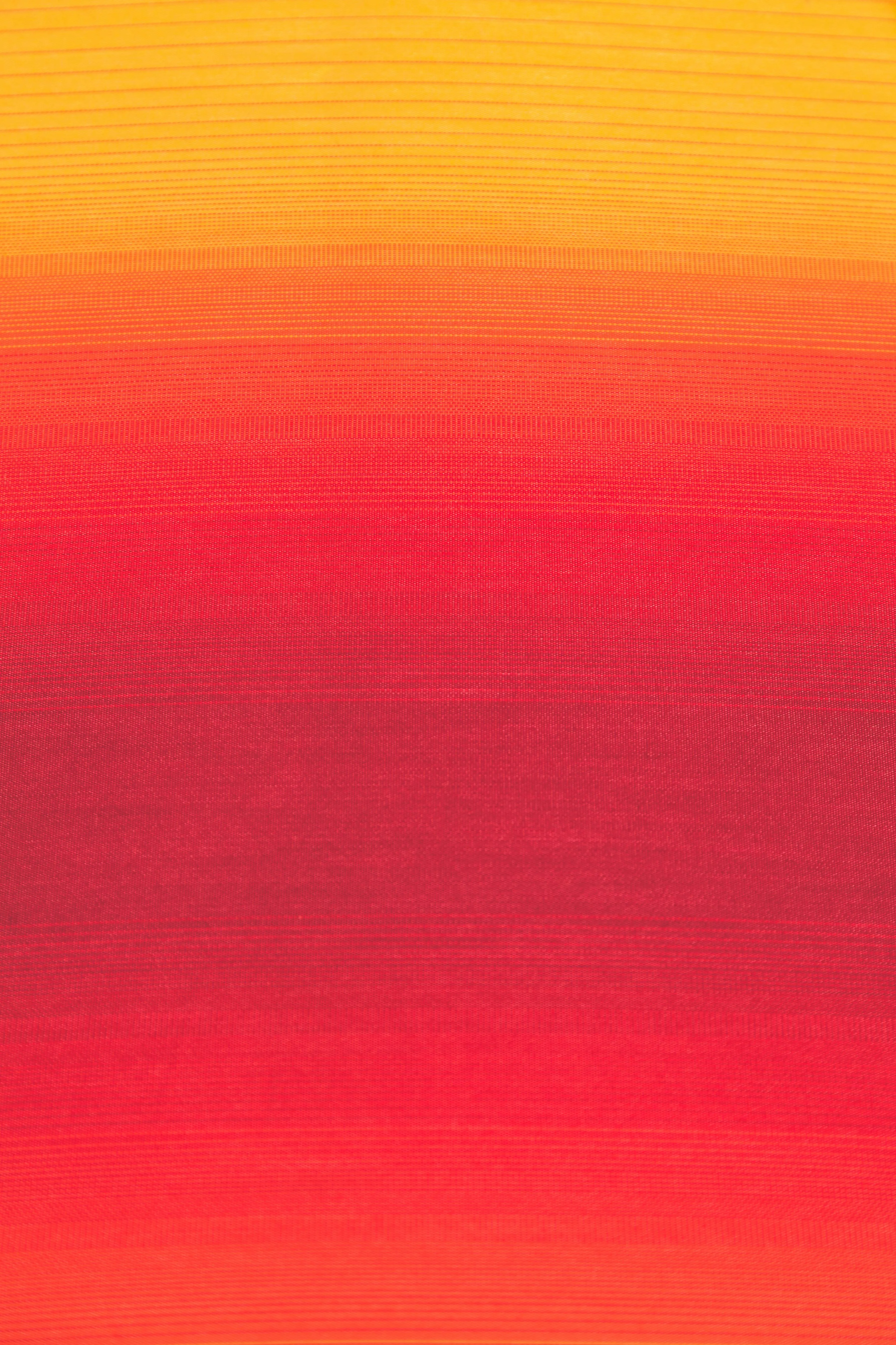 Gradient fabric texture in red orange and yellow Wallpaper