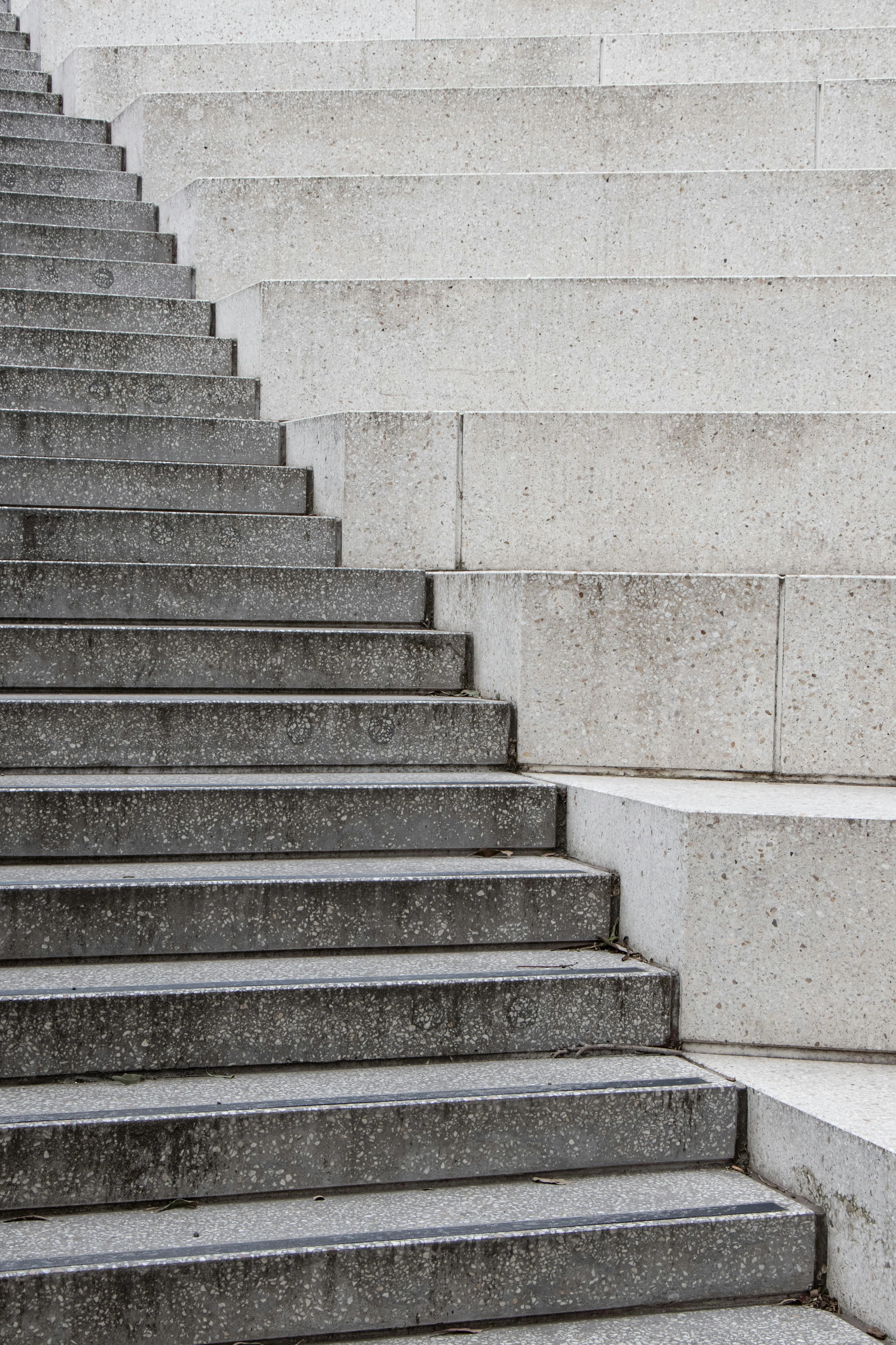 Gray stone stairs going up with a simple clean design image