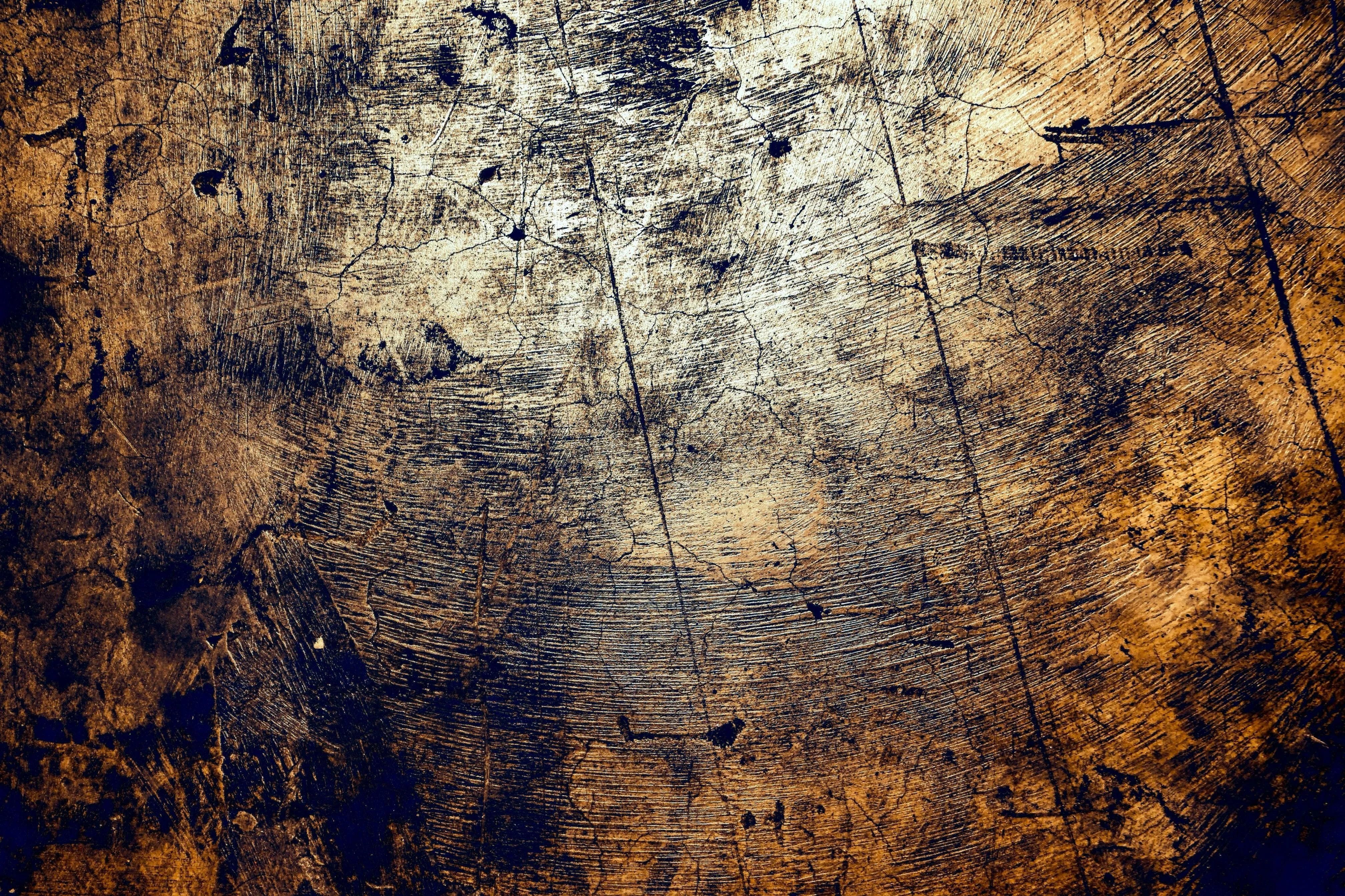 Grungy scratched metal surface with rustic brown tones image