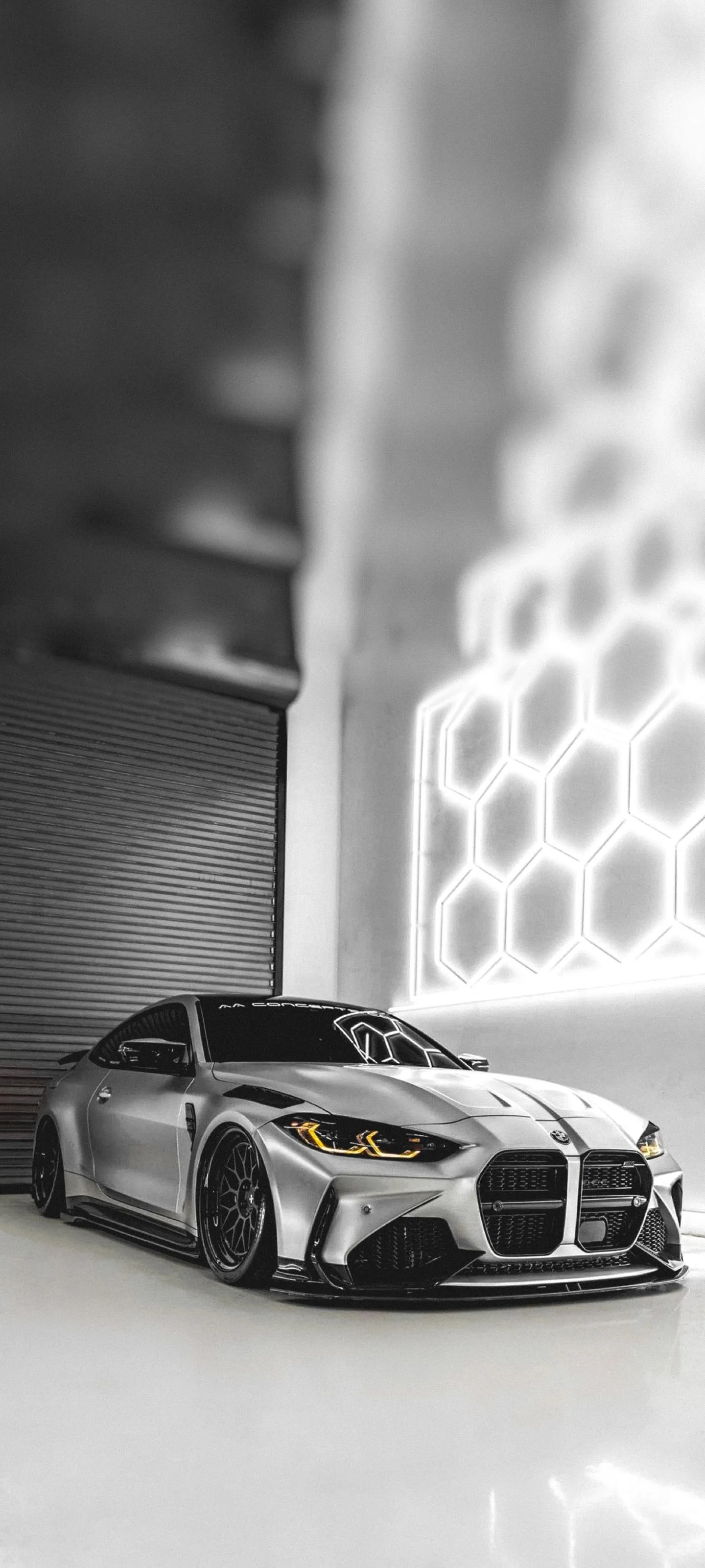 Luxury Sports Car in Monochrome Studio Lighting Setup
