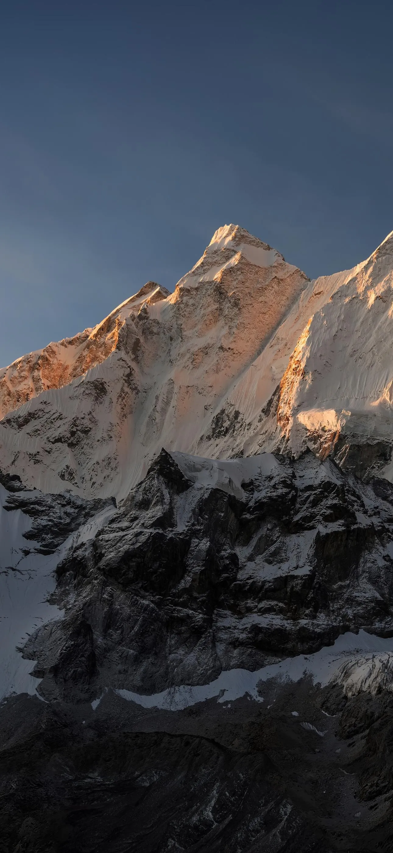 Majestic Snowy Mountain Peak at Sunrise in Nature Wallpaper