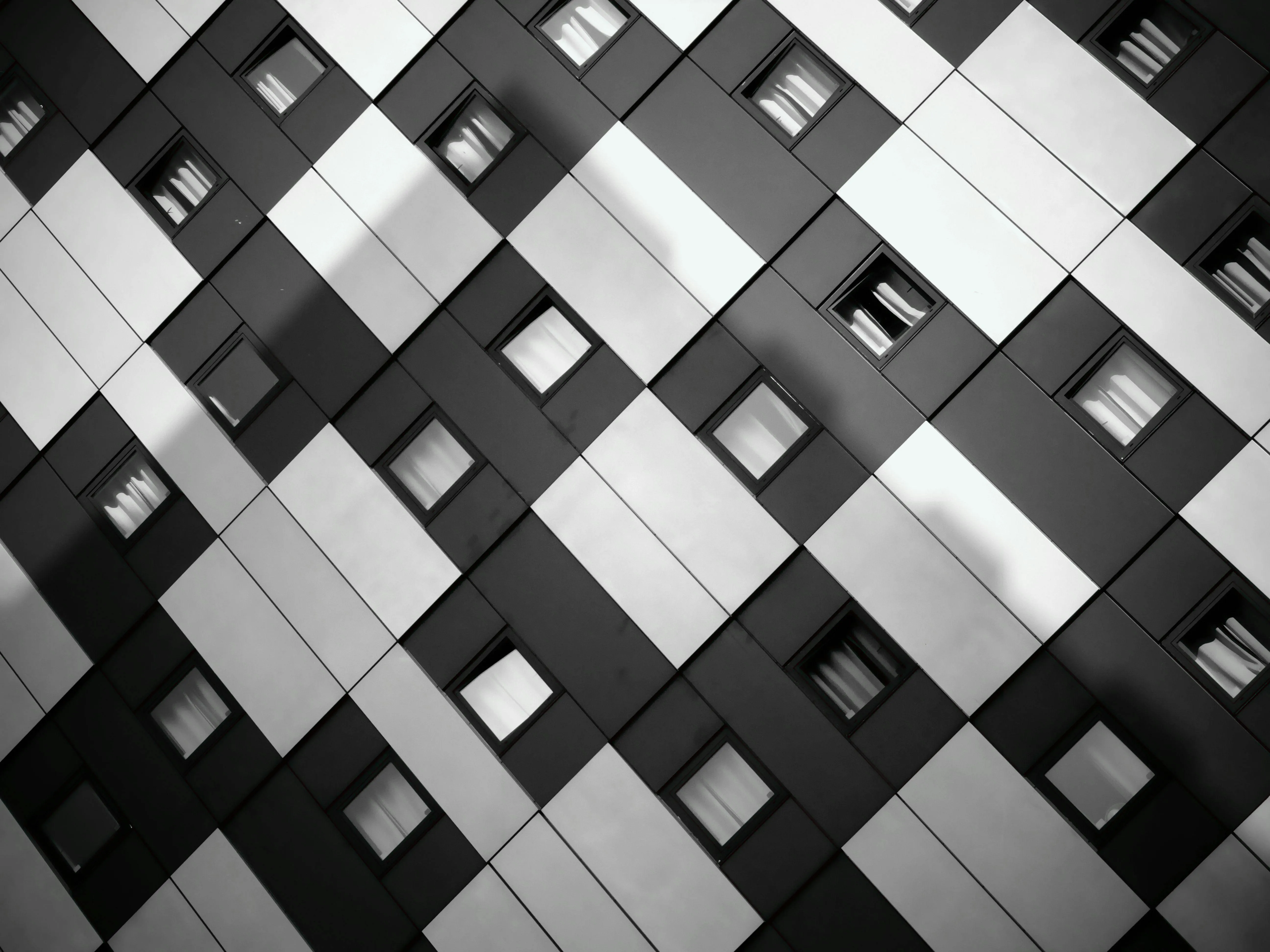 Modern black and white geometric building facade pattern