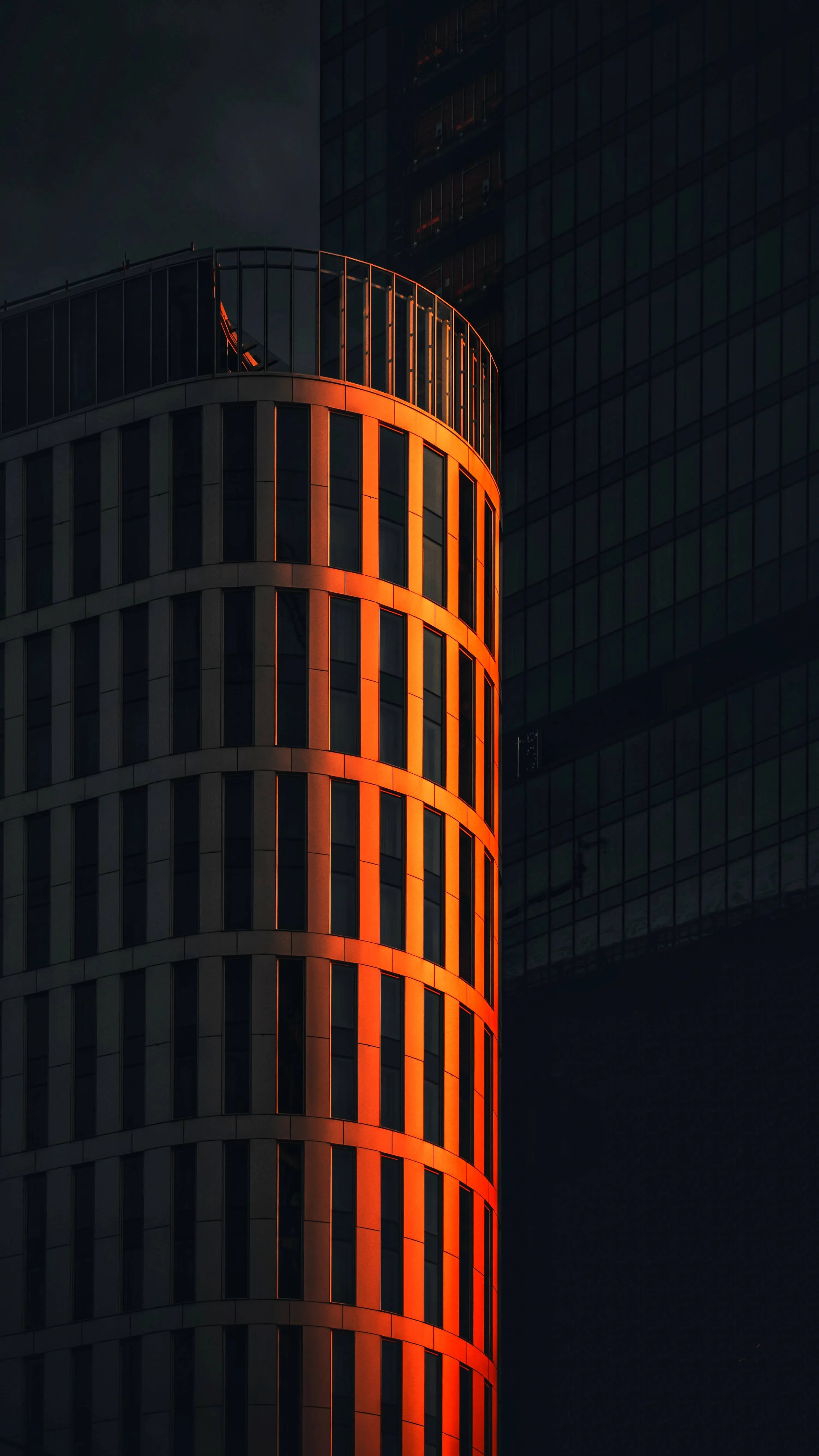 Modern Office Building Facade with Warm Sunset Wallpaper